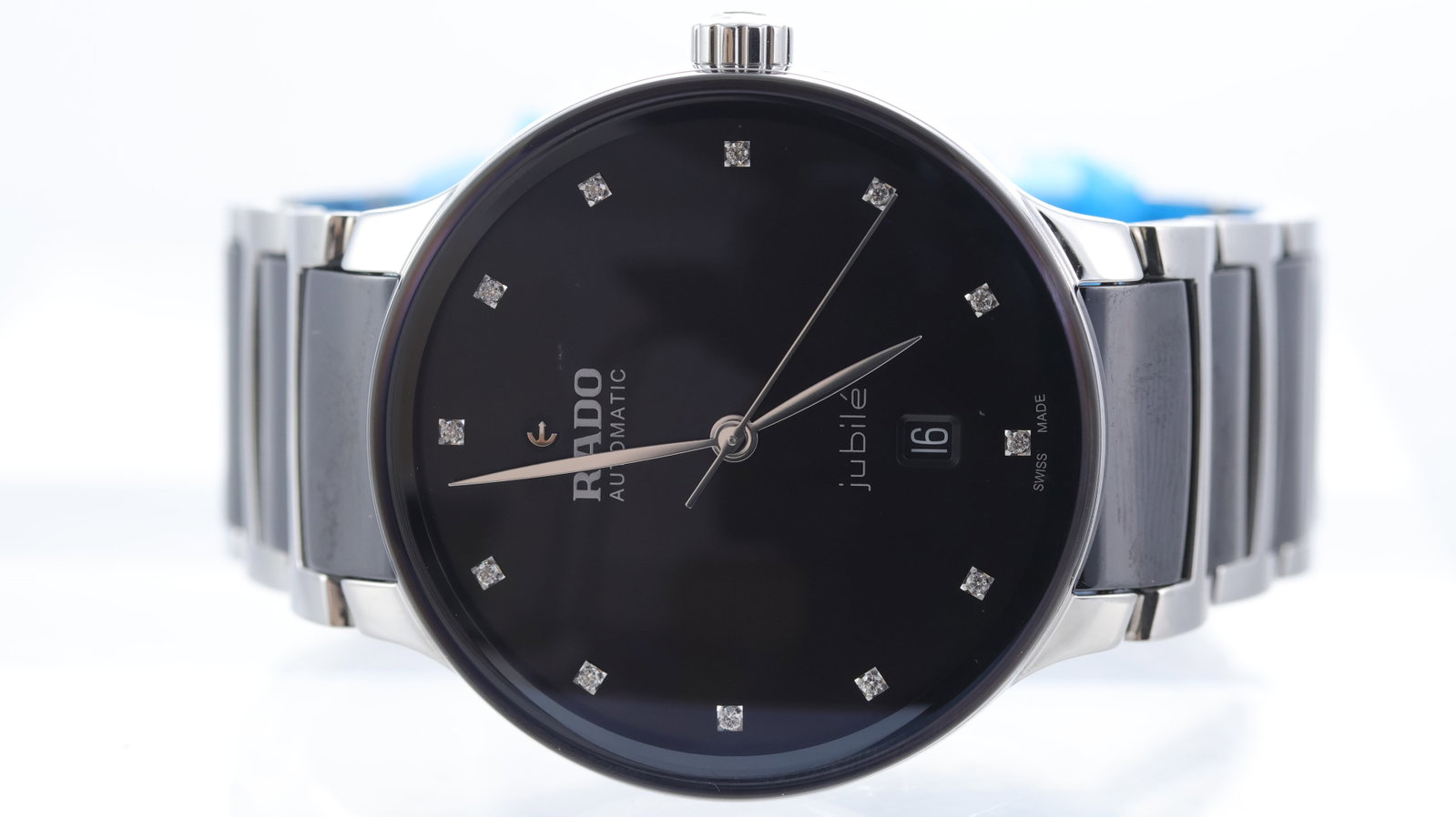Rado Centrix Jubile Automatic: Brand: Rado Model Name: Centrix Jubile Movement type: Automatic Movement calibre: Rado R763 Dial shape: Circular Dial colour: Black Dial features: Silver hands. Dot diamond hour markers. Quickset