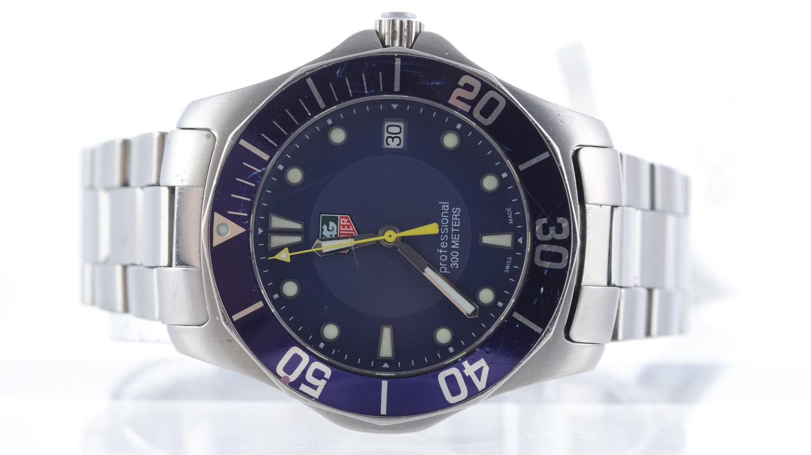 Tag Heuer Professional Ref WAB1112: Brand: Tag Heuer Model Name: Professional Reference: WAB1112 Movement type: Automatic Dial shape: Circular Dial colour: Blue Dial features: Dot hour markers, quickset date hour markers at 3 o'clock