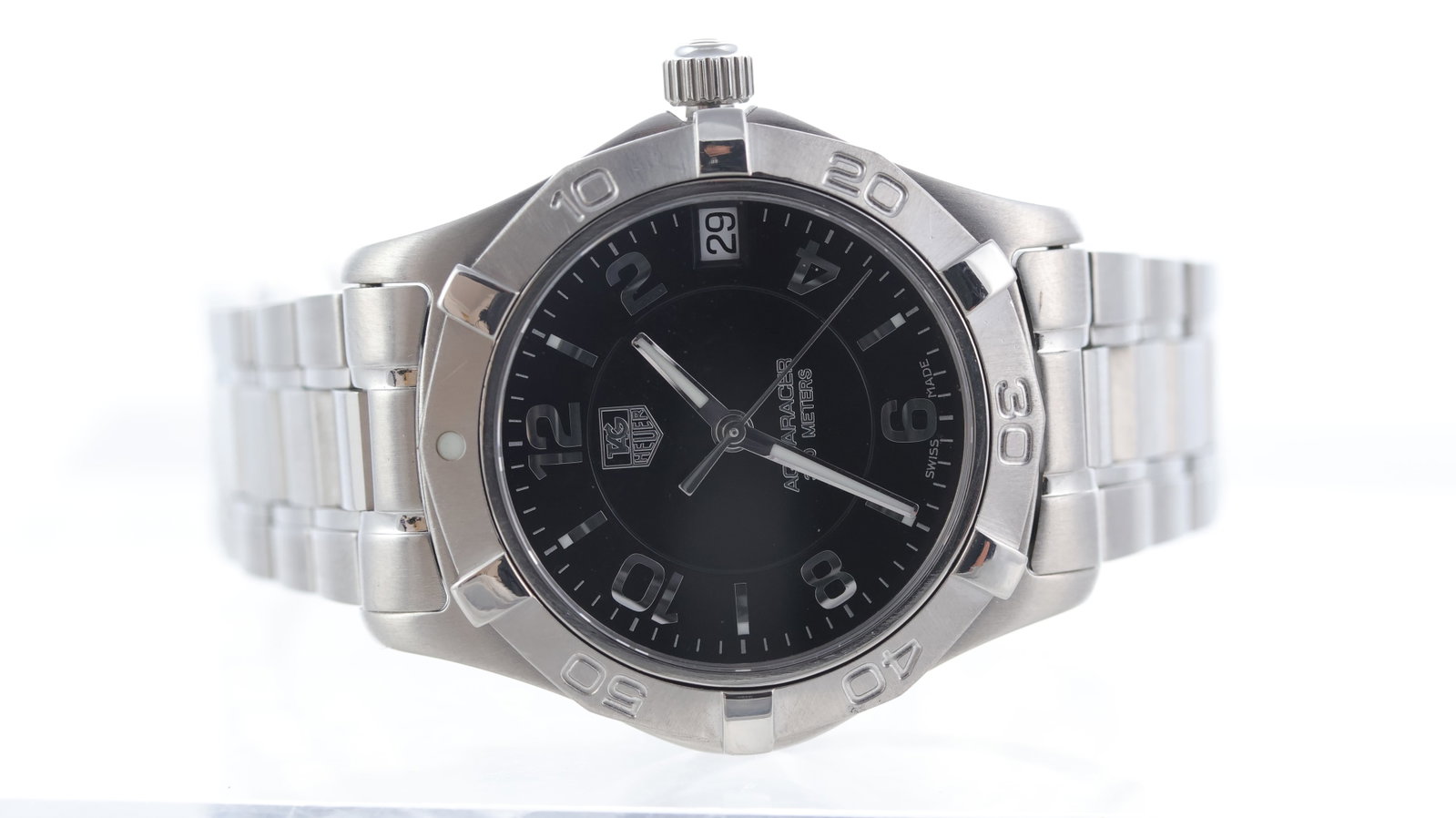 Tag Heuer Aquaracer Quartz Date Ref WAF1310: Brand: Tag Heuer Model Name: Aquaracer Reference: WAF1310 Movement type: Quartz Dial shape: Circular Dial colour: Black Dial features: Applied baton and arabic numeral hour markers. Date aperture at