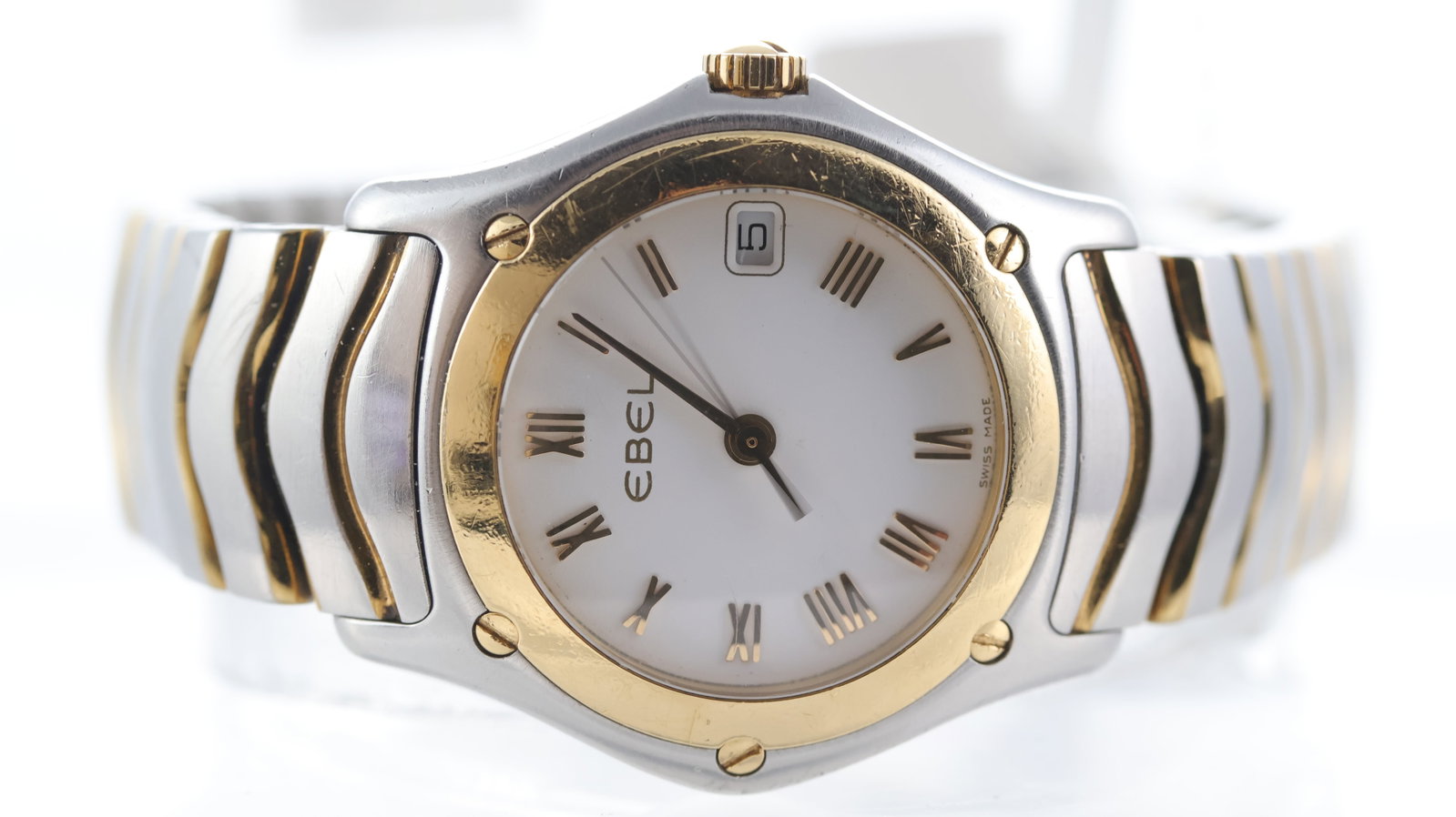 Ebel Classic Wave Ref E1087F21 with Box and Papers 2002: Brand: Ebel Model Name: Classic Wave Reference: E1087F21 Movement type: Quartz Year: 2002 Box: Inner and outer box Box features: interior degrading Papers: Guarantee Card Papers features: Ebel card