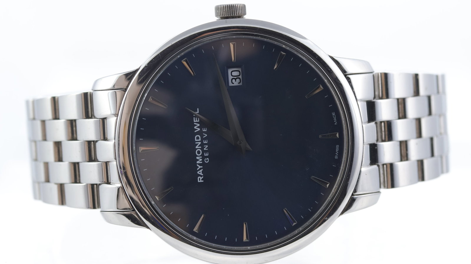 Raymond Weil Tango Ref 5488: Brand: Raymond Weil Model Name: Tango Reference: 5488 Movement type: Quartz Dial shape: Circular Dial colour: Blue Dial features: pointed hour markers, date aperture Case size: Approx 39mm Case