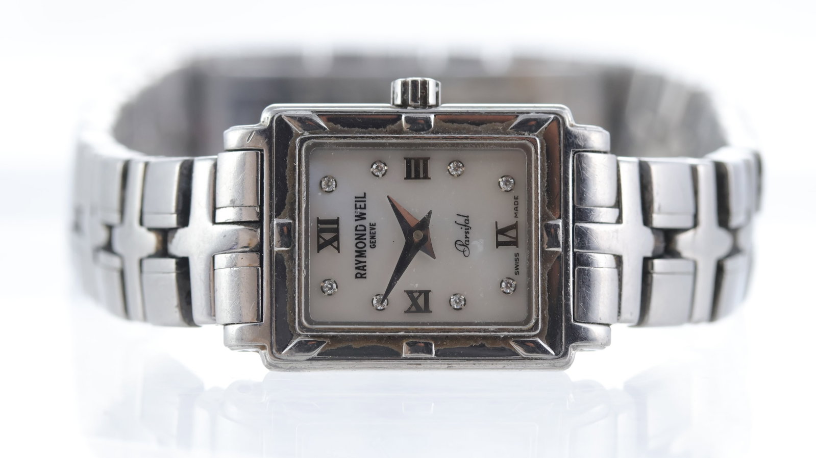 Raymond Weil Parsifal Ref 9631: Brand: Raymond Weil Model Name: Parsifal Reference: 9631 Movement type: Quartz Dial shape: Rectangular Dial colour: Mother of Pearl Dial features: Silver hands with roman numeral hour markers and dot