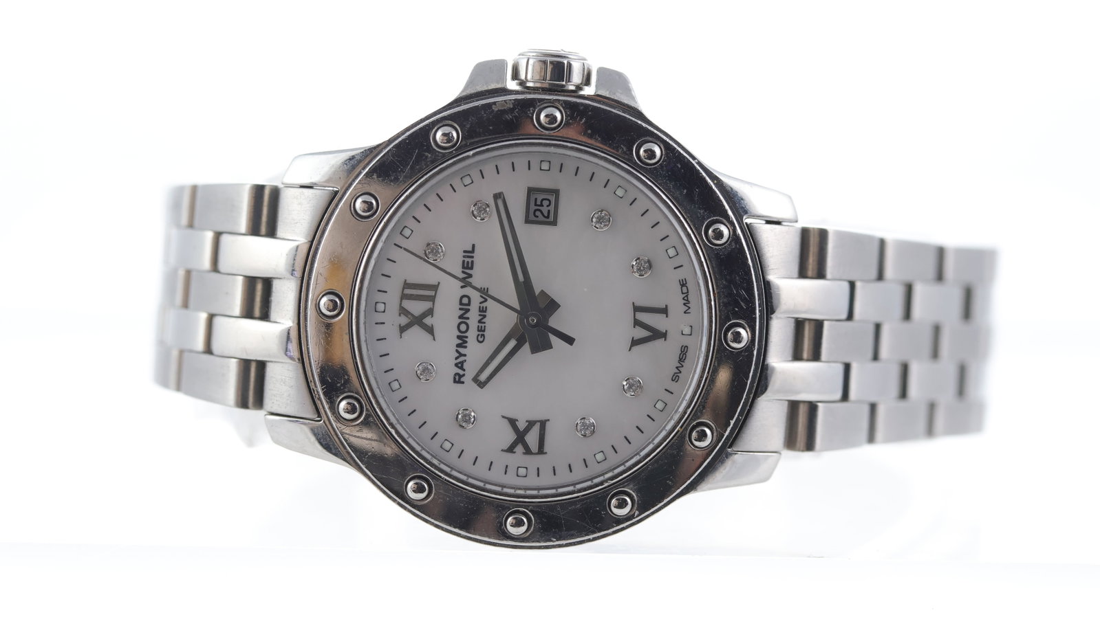 Raymond Weil Tango Ref 5399: Brand: Raymond Weil Model Name: Tango Reference: 5399 Movement type: Quartz Dial shape: Circular Dial colour: Mother of Pearl Dial features: Diamond and roman numerals, quickset date aperture at 3