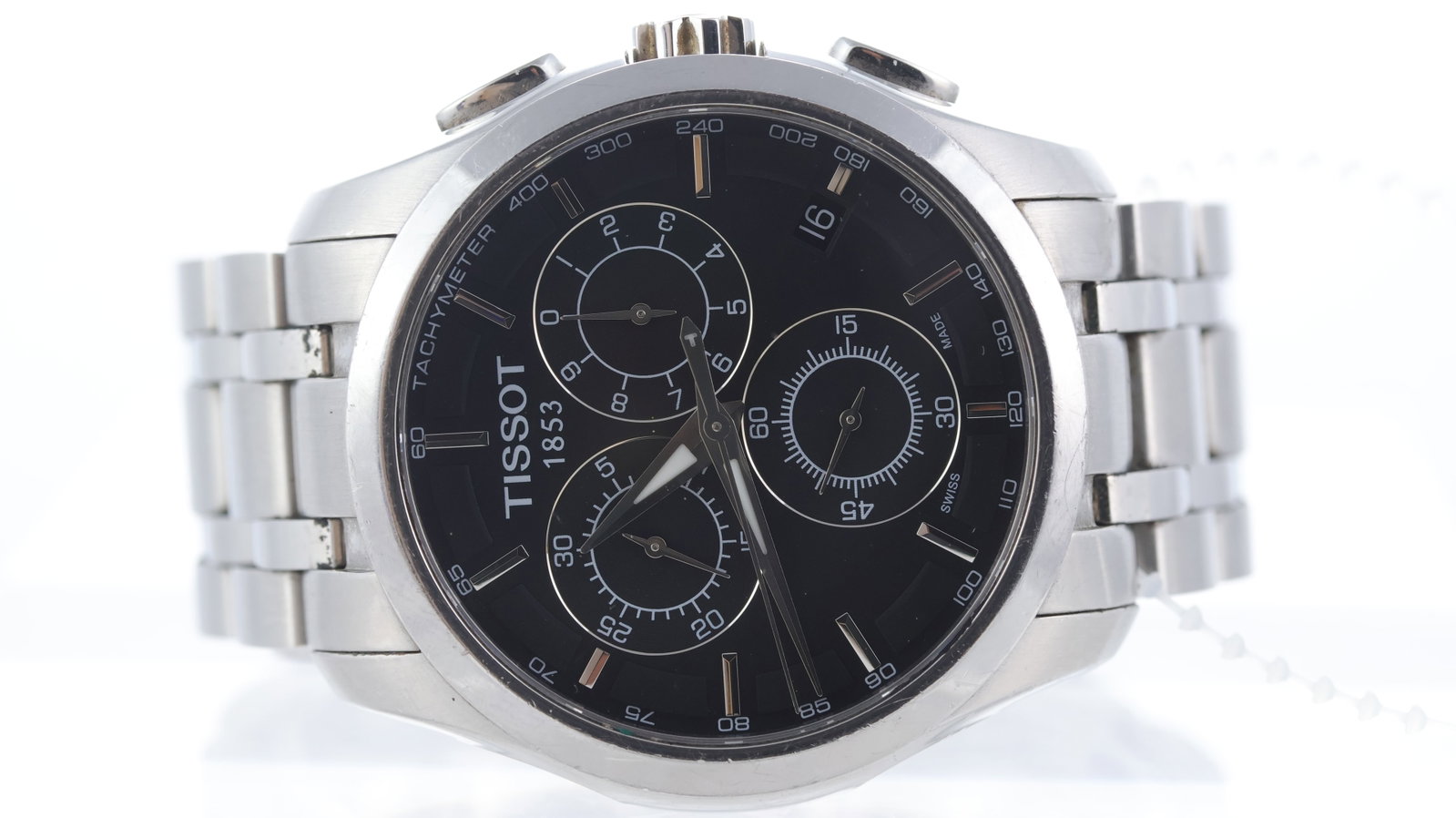 Tissot Couturier Ref T035617A: Brand: Tissot Model Name: Couturier Reference: T035617A Movement type: Quartz Dial shape: Circular Dial colour: Black Dial features: Baton hour markers, three sub dials, date aperture, tachymeter
