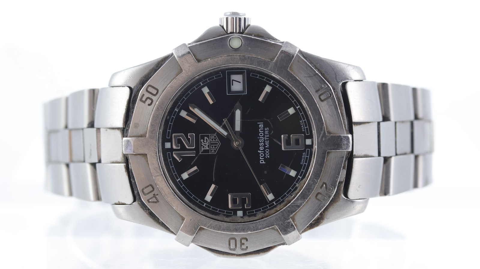 Tag Heuer Professional Quartz Ref WN1110: Brand: Tag Heuer Model Name: Professional Reference: WN1110 Movement type: Quartz Dial shape: Circular Dial colour: Black Dial features: Baton and arabic numeral hour markers Bezel: uni-directional