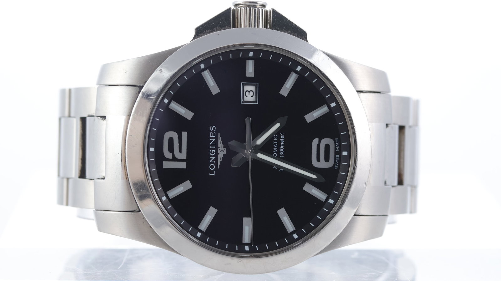 Longines Conquest Ref L3.778.4: Brand: Longines Model Name: Conquest Reference: L3.778.4 Movement type: Automatic Dial shape: Circular Dial colour: Black Dial features: Bold white Arabic numeral and baton hour markers, quickset