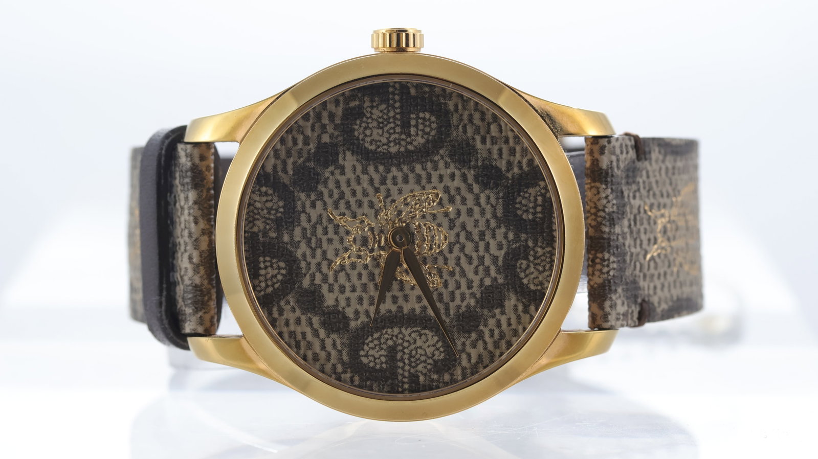 Gucci G Timeless 'Bumblee Bee' Ref 126.4 with Box and Papers: Brand: Gucci Model Name: G Timeless Reference: 126.4 Movement type: Quartz Box: Full Box Papers: Associated Papers Papers features: Blank papers Dial shape: Circular Dial colour: Pattered Dial