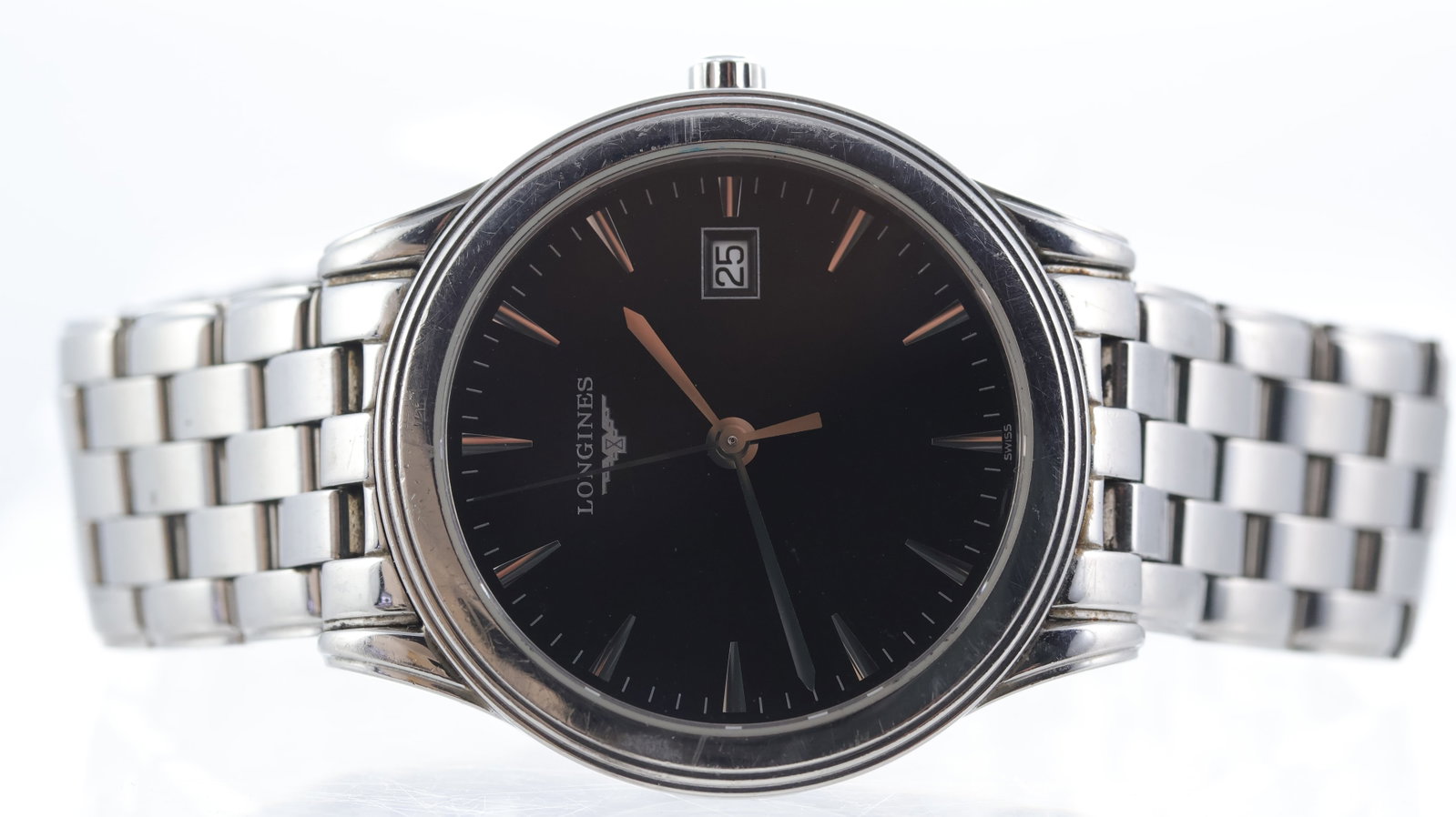 Longines Flagship Ref L4.716.4 with Box and Papers 2011: Brand: Longines Model Name: Flagship Reference: L4.716.4 Movement type: Quartz Year: 2011 Box: Full Box Papers: Full Set Papers Dial shape: Circular Dial colour: Black Dial features: Silver hands and
