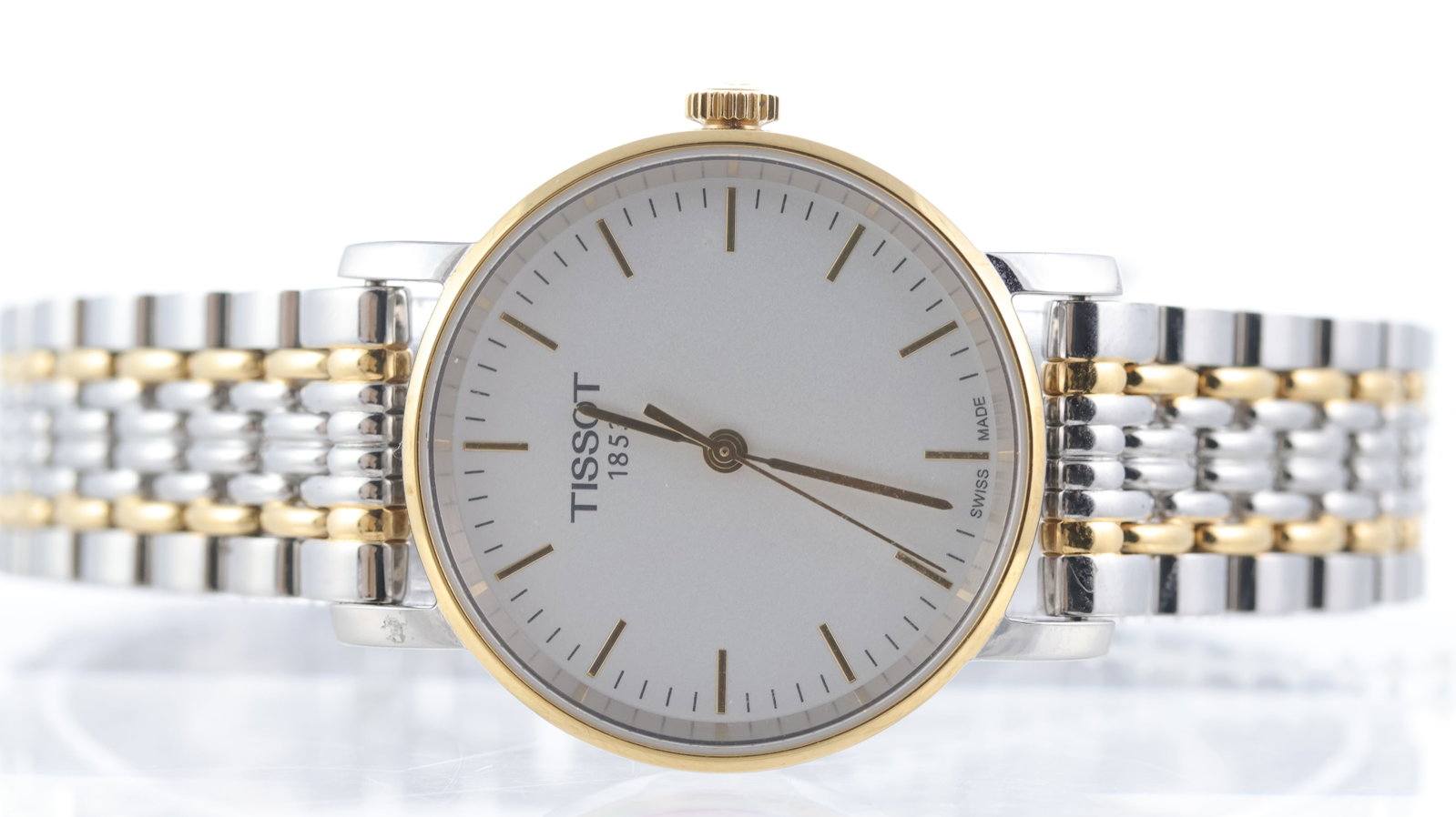Tissot Everytime Quartz Ref T109210A: Brand: Tissot Model Name: Everytime Reference: T109210A Movement type: Quartz Dial shape: Circular Dial colour: White Dial features: Baton hour markers Bezel: Smooth gold plated bezel Case size: 30mm