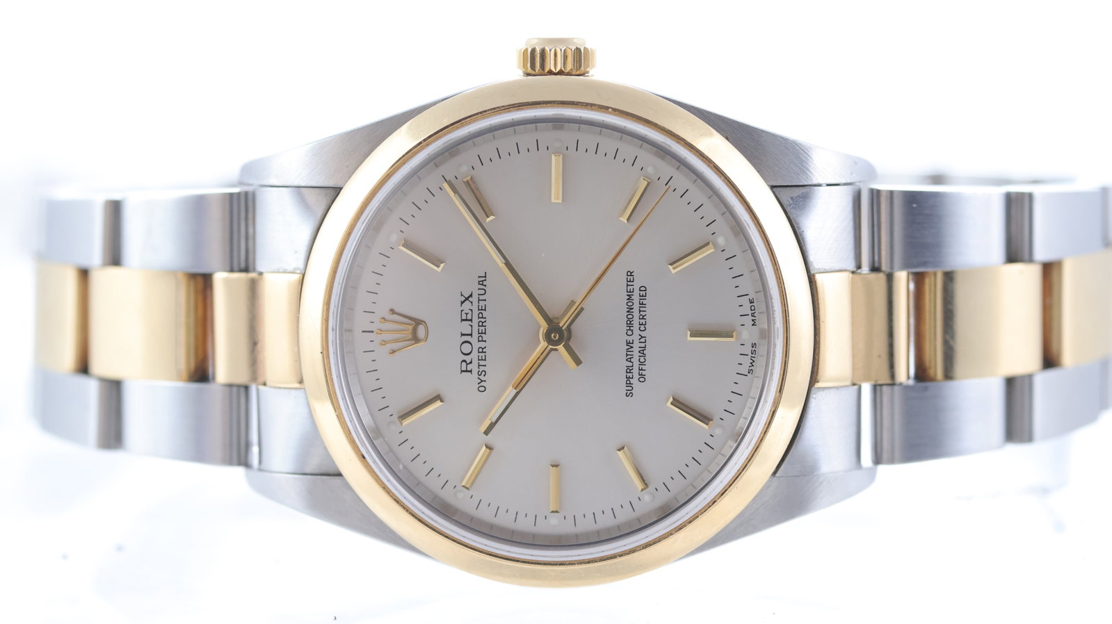 Rolex Oyster Perpetual Ref 14203 Circa 2000: Brand: Rolex Model Name: Oyster Perpetual Reference: 14203 Movement type: Automatic Movement calibre: Rolex 3000 Year: Circa 2000 Dial shape: Circular Dial colour: Silver Dial features: Gold baton hou