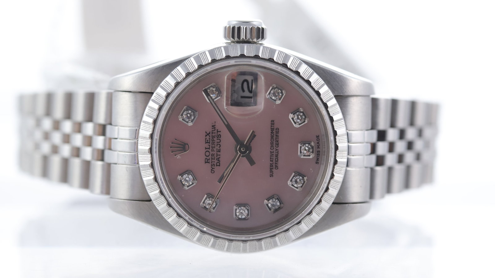 Ladies Rolex Datejust 26 Ref 69174: Brand: Rolex Model Name: Datejust 26 Reference: 69174 Movement type: Automatic Movement calibre: Rolex 2135 Year: Circa 1989 Dial shape: Circular Dial colour: Mother of Pearl Dial features: Aftermarke