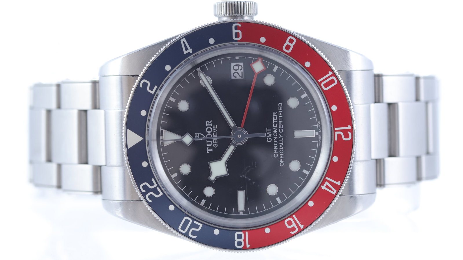 Tudor Black Bay GMT 'Pepsi' Ref 79830: Brand: Tudor Model Name: GMT Reference: 79830 Movement type: Automatic Dial shape: Circular Dial colour: Black Dial features: Snowflake hands with lume filled hour markers with additional red 24 hour 