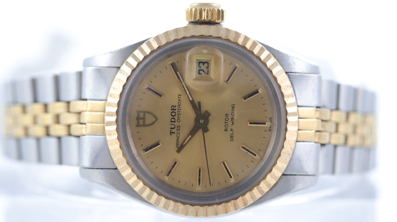 Tudor Princess Date Ref 92413 Circa 1985: Brand: Tudor Model Name: Princess Date Reference: 92413 Movement type: Automatic Year: Circa 1985 Dial shape: Circular Dial colour: Champagne Dial features: Shield logo, baton hour markers, quickset