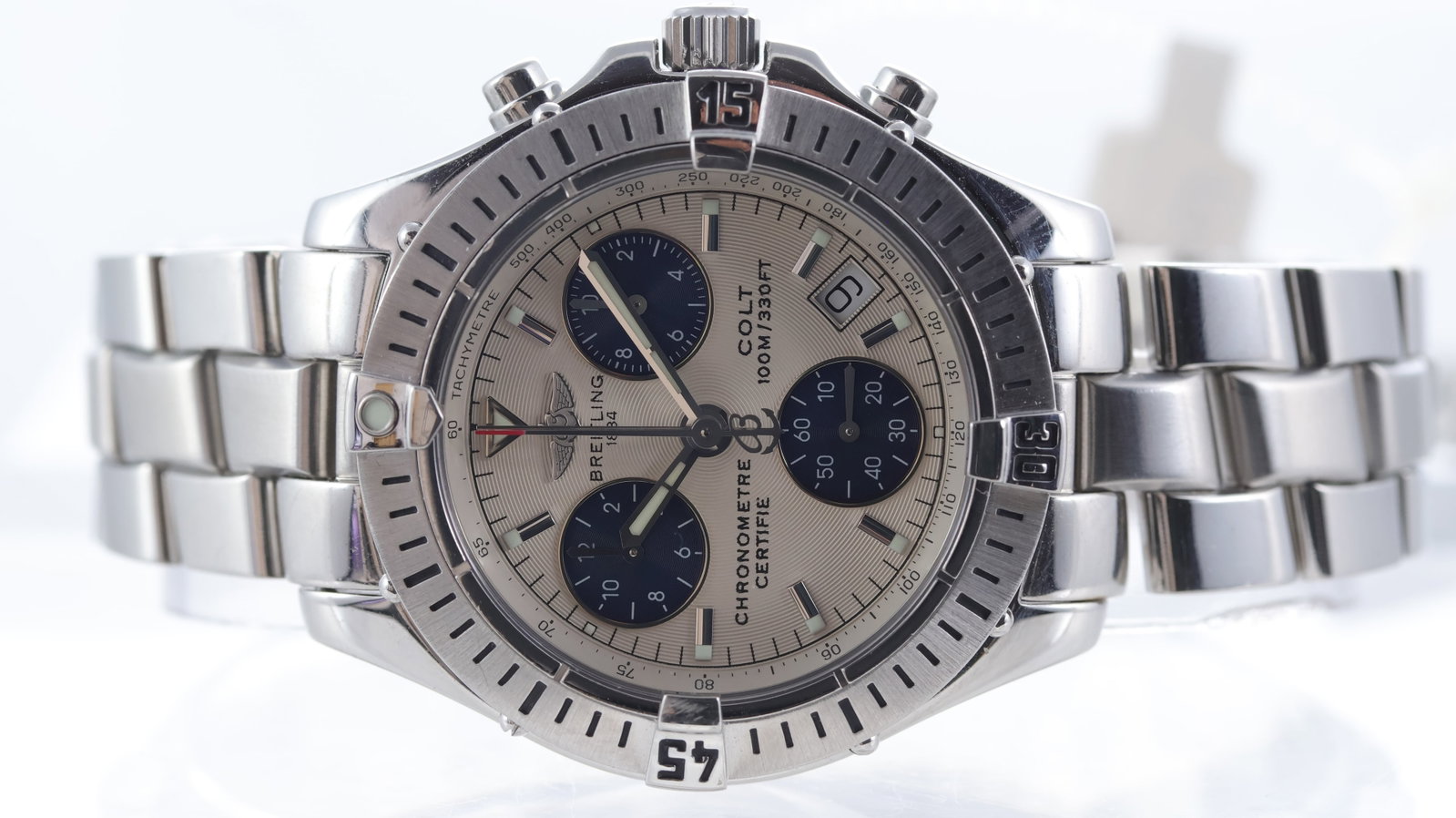 Breitling Colt Quartz Chronograph Ref A73350 with Papers 2005: Brand: Breitling Model Name: Colt Reference: A73350 Movement type: Quartz Year: 2005 Papers: Full Set Papers Dial shape: Circular Dial colour: Silver Dial features: Applied baton hour markers. Date ap