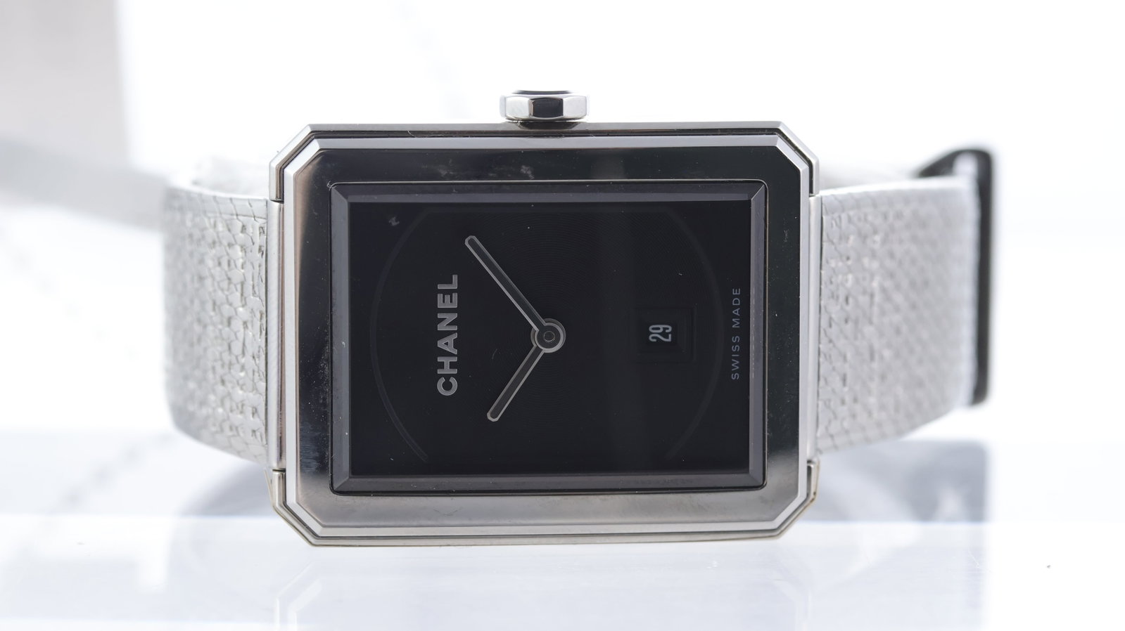 Chanel Boy-friend 'Tweed' Quartz Ref H4878: Brand: Chanel Model Name: BOY.FRIEND Reference: H4878 Movement type: Quartz Dial shape: Rectangular Dial colour: Dark Grey Dial features: Tonneau depressed centre with a circular texture. Date apertur
