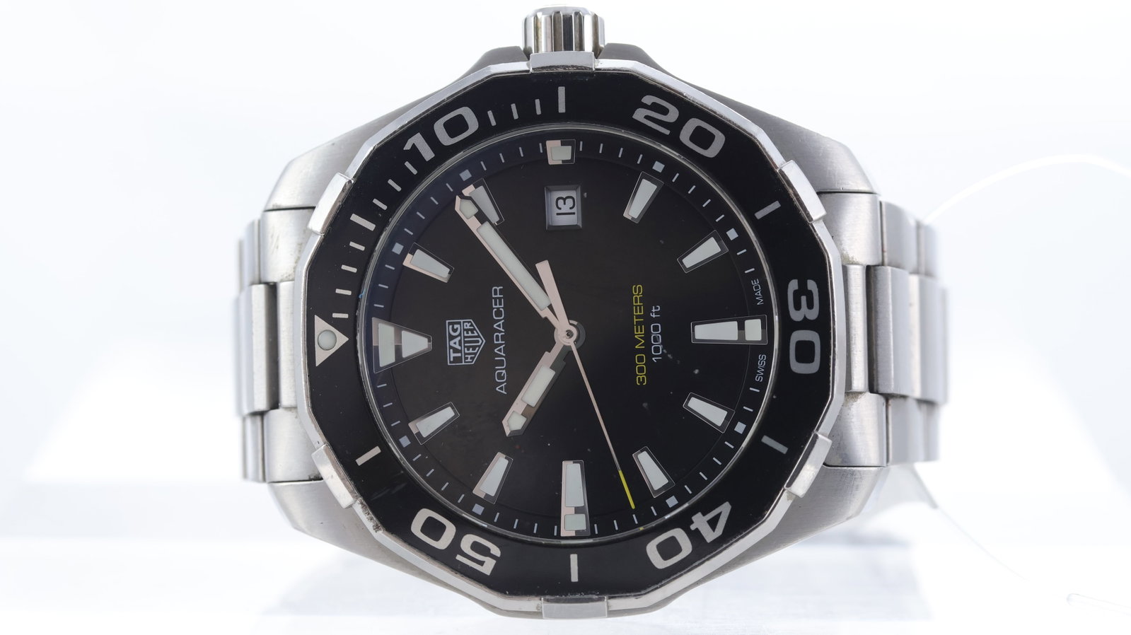 Tag Heuer Aquaracer Ref WAY101A: Brand: Tag Heuer Model Name: Aquaracer Reference: WAY101A Movement type: Quartz Dial shape: Circular Dial colour: Black Dial features: Silver/Lume hands and baton hour markers. Date aperture at 3 o'cl