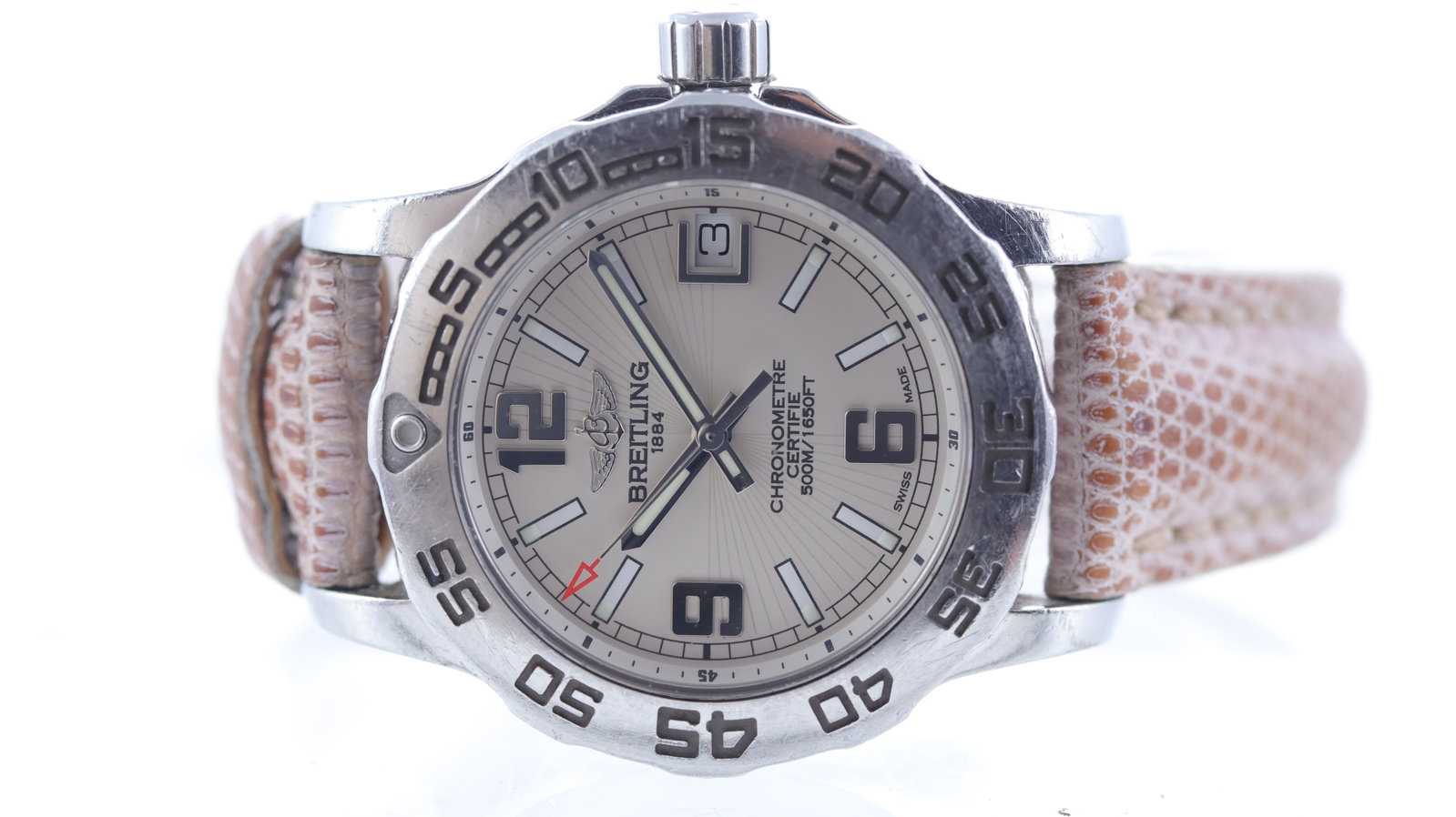 Breitling Colt Quartz Ref A77387: Brand: Breitling Model Name: Colt Reference: A77387 Movement type: Quartz Dial shape: Circular Dial colour: Silver Dial features: Baton and arabic numeral hour markers. Radial pattern. Date aperture. 