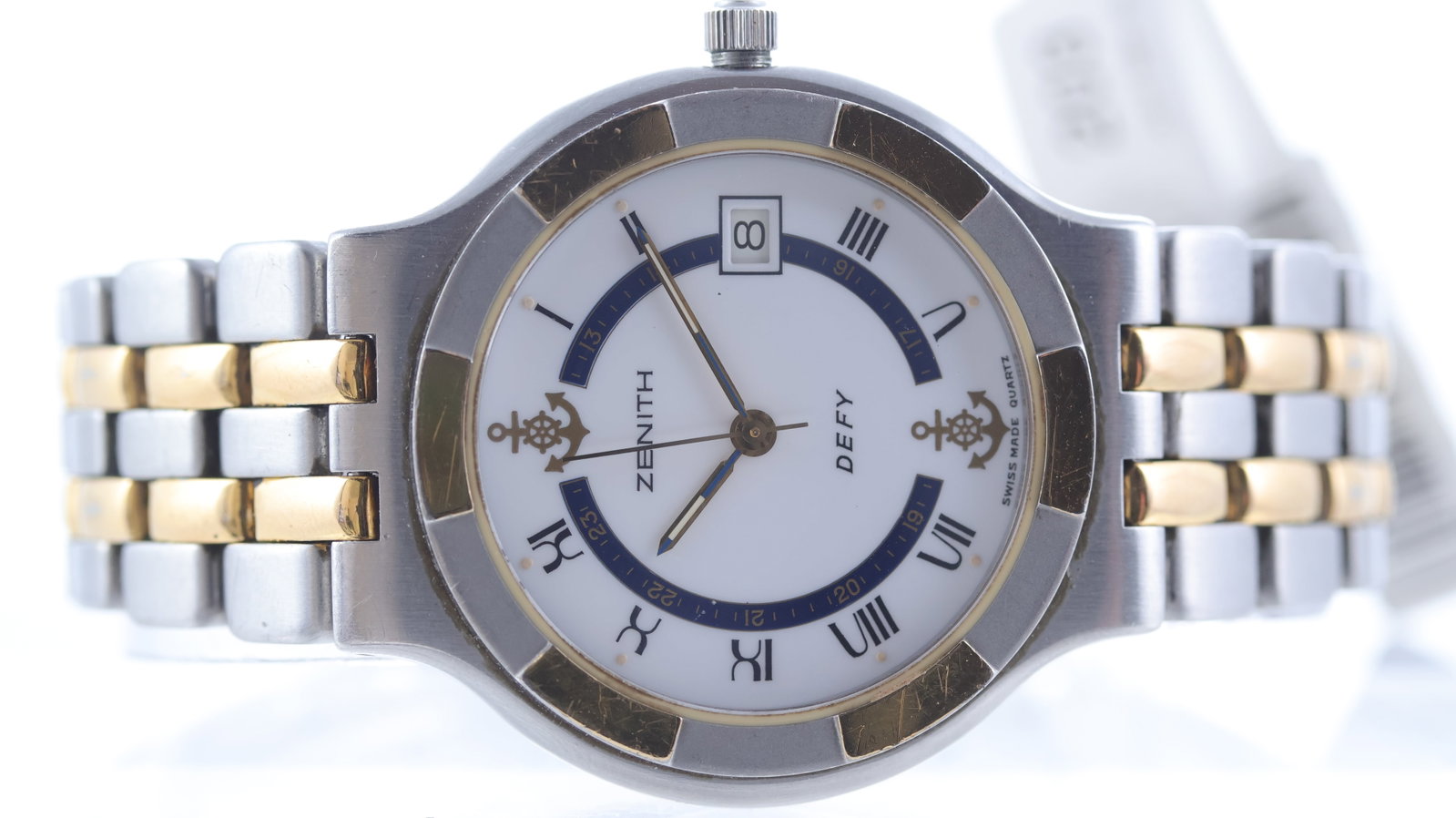 Zenith Defy 'Nautical' Quartz Ref 59.0730.387: Brand: Zenith Model Name: Defy 'Nautical' Reference: 59.0730.387 Movement type: Quartz Dial shape: Circular Dial colour: White Dial features: Black roman numeral hour markers. Inner blude 24hrs track.