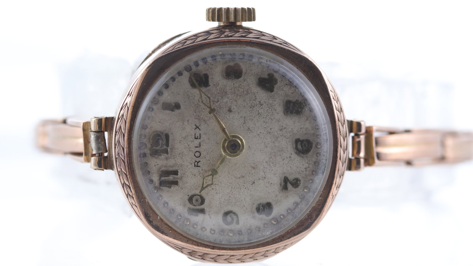 Vintage 9ct Rolex Cocktail Watch Circa 1930's: Brand: Rolex Model Name: Cocktail Watch Movement type: Manual Wind Year: Circa 1930's Dial shape: Circular Dial colour: Silver Patina Dial features: Gilt, hollow diamond hands and applied arabic numer