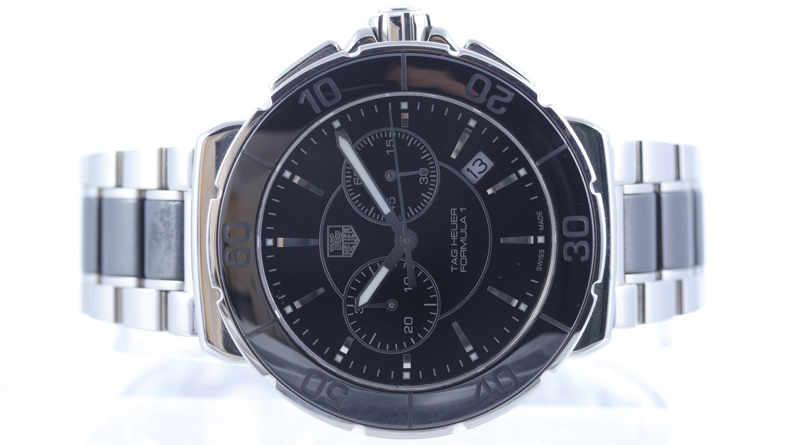 Tag Heuer Formula 1 Ref CAH1210: Brand: Tag Heuer Model Name: Formula 1 Reference: CAH1210 Movement type: Quartz Dial shape: Circular Dial colour: Black Dial features: Applied silver 'door wedge' hour markers. Date aperture at 4:30. 