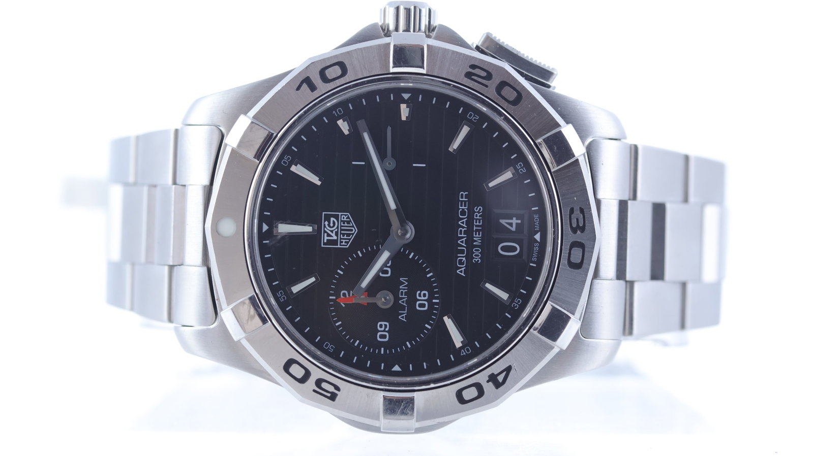 Tag Heuer Aquaracer Quartz Alarm Ref WAP111Z: Brand: Tag Heuer Model Name: Aquaracer Reference: WAP111Z Movement type: Quartz Dial shape: Circular Dial colour: Black Dial features: Striped dial. Sub seconds and alarm. Date aperture at 6 o'clock. 