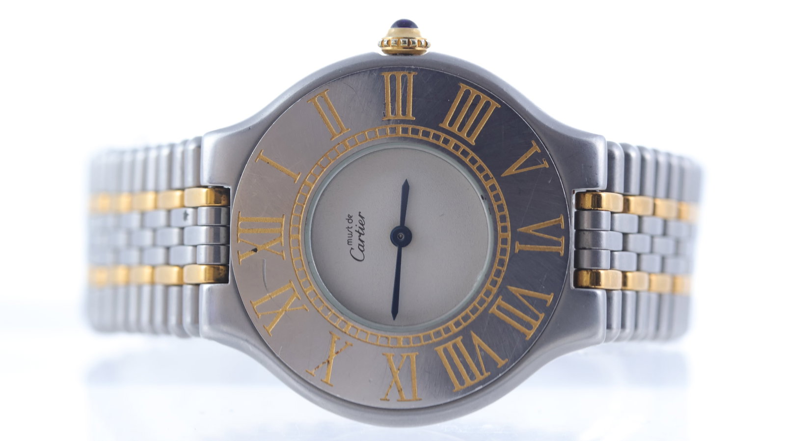 *To Be Sold Without Reserve* Cartier Must 21 De Cartier: Brand: Cartier Model Name: Must 21 De Cartier Movement type: Quartz Dial shape: Circular Dial colour: White Dial features: Classic blue steel hands Bezel: Roman numeral bezel gilt Case size: 31mm Case