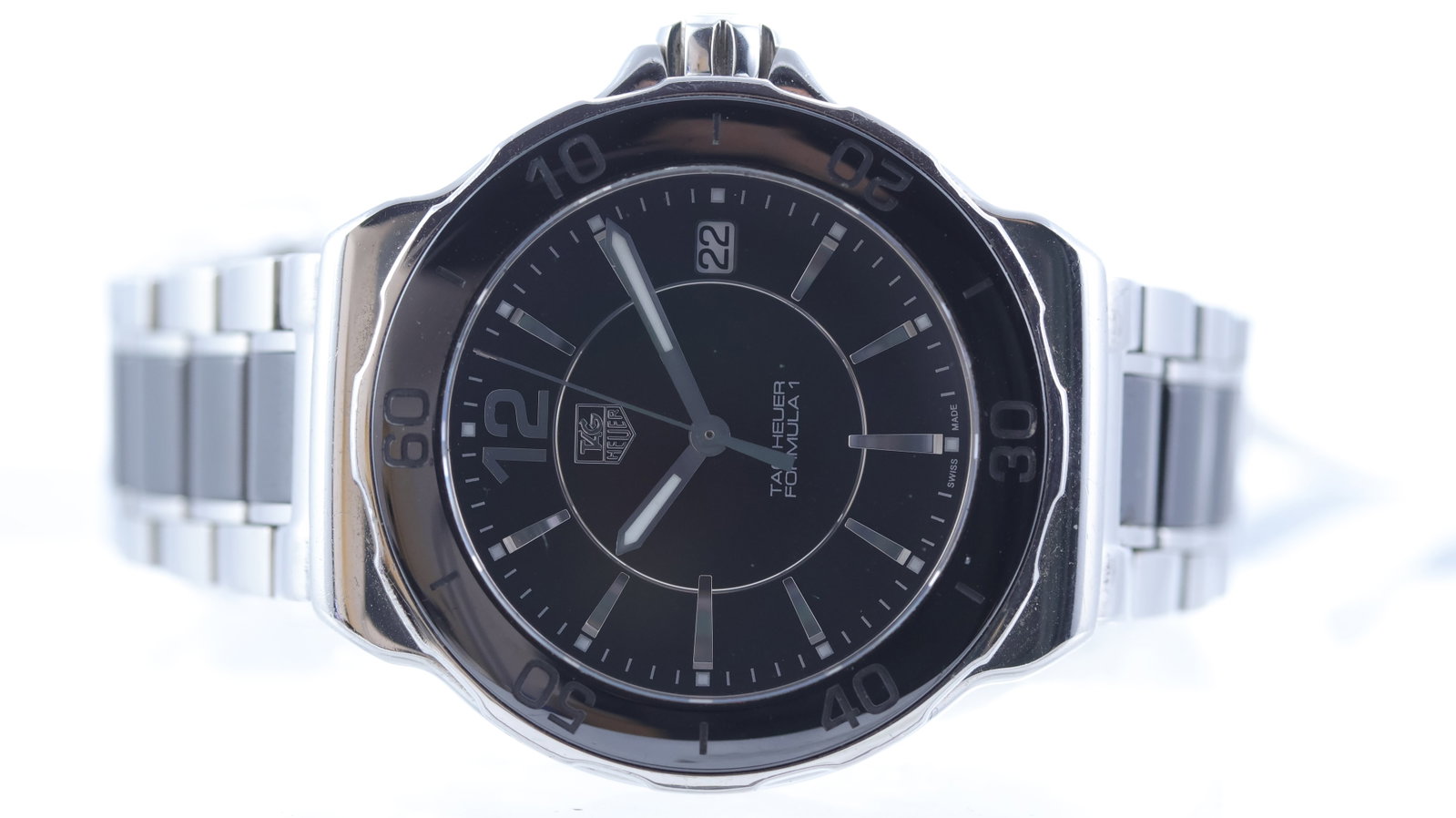Tag Heuer Formula 1 Ref WAH1210: Brand: Tag Heuer Model Name: Formula 1 Reference: WAH1210 Movement type: Quartz Dial shape: Circular Dial colour: Black Dial features: Silver hour markers, Arabic numeral 12, quickset date aperture at