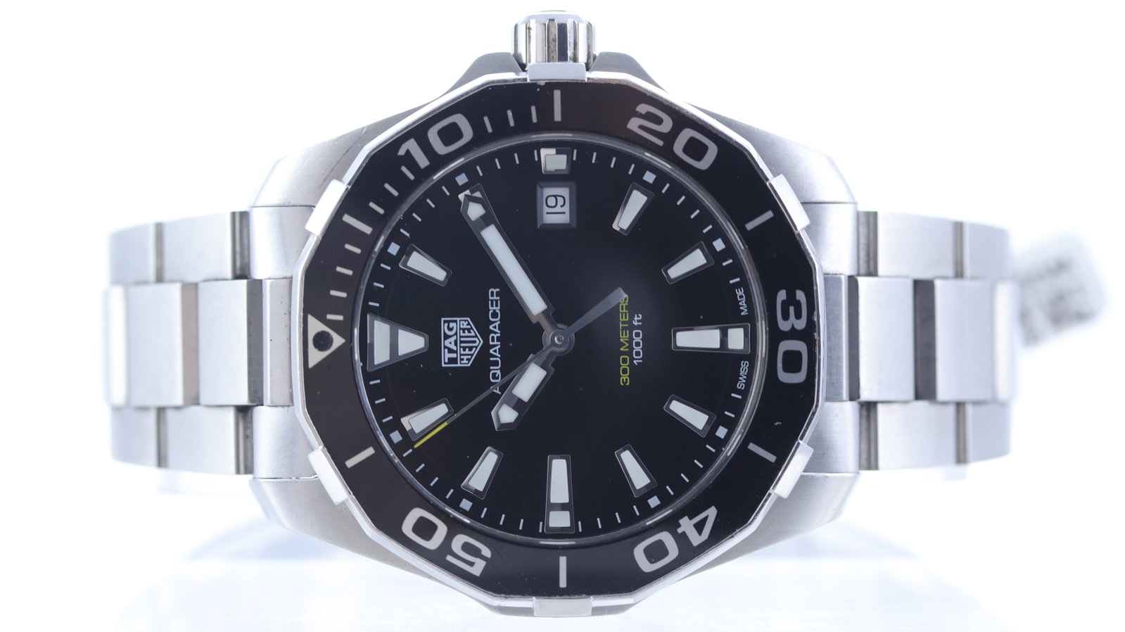Tag Heuer Aquaracer Quartz Ref WAY111A: Brand: Tag Heuer Model Name: Aquaracer Reference: WAY111A Movement type: Quartz Dial shape: Circular Dial colour: Black Dial features: Applied trapezium hour markers with lume inserts. Bezel: Rotating