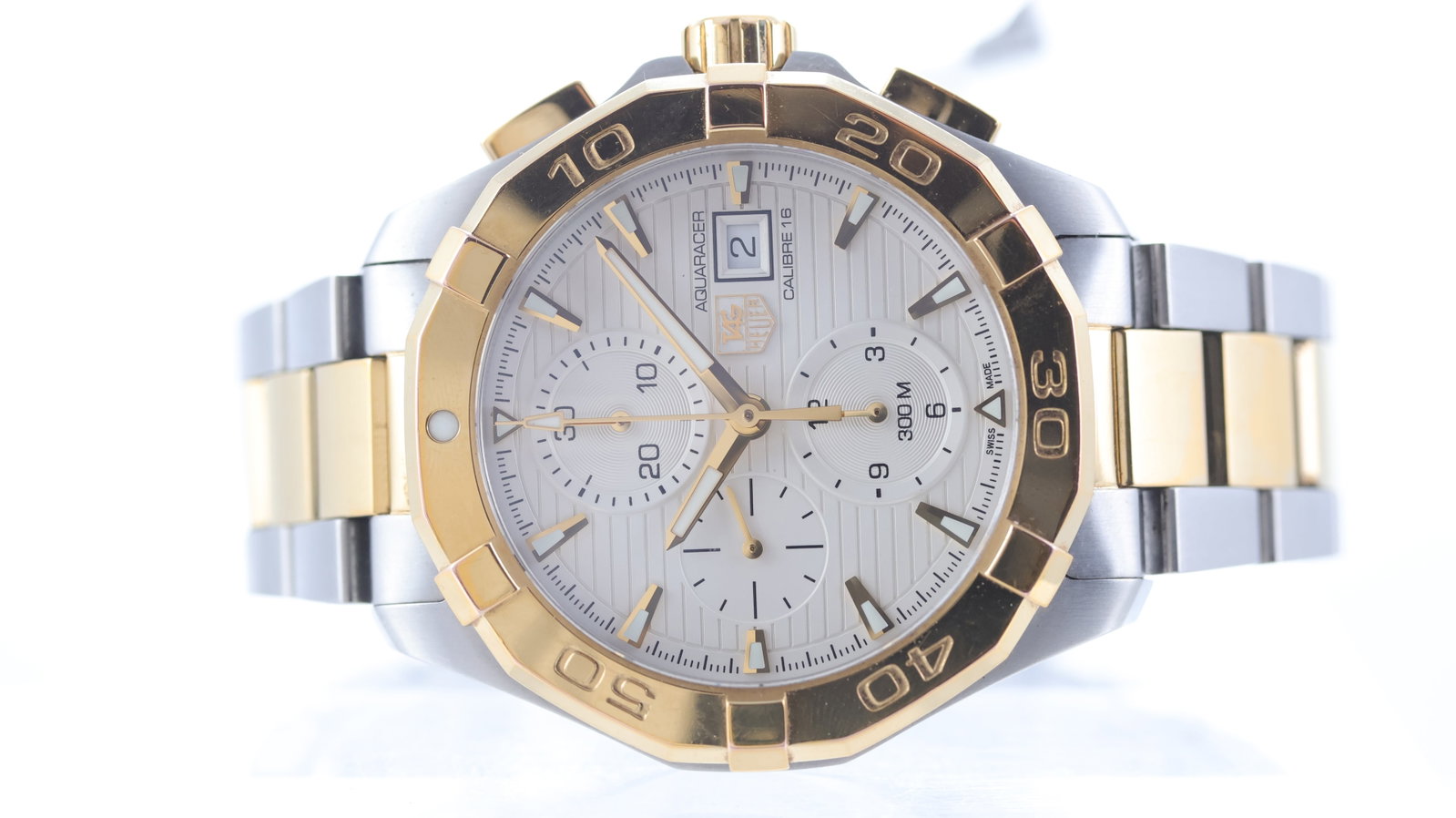 Tag Heuer Aquaracer Chronograph Calibre 16 Ref CAY2121-0: Brand: Tag Heuer Model Name: Aquaracer Reference: CAY2121-0 Movement type: Automatic Movement calibre: Tag Heuer 16 Dial shape: Circular Dial colour: Silver Dial features: Striped dial. Applied gilt h