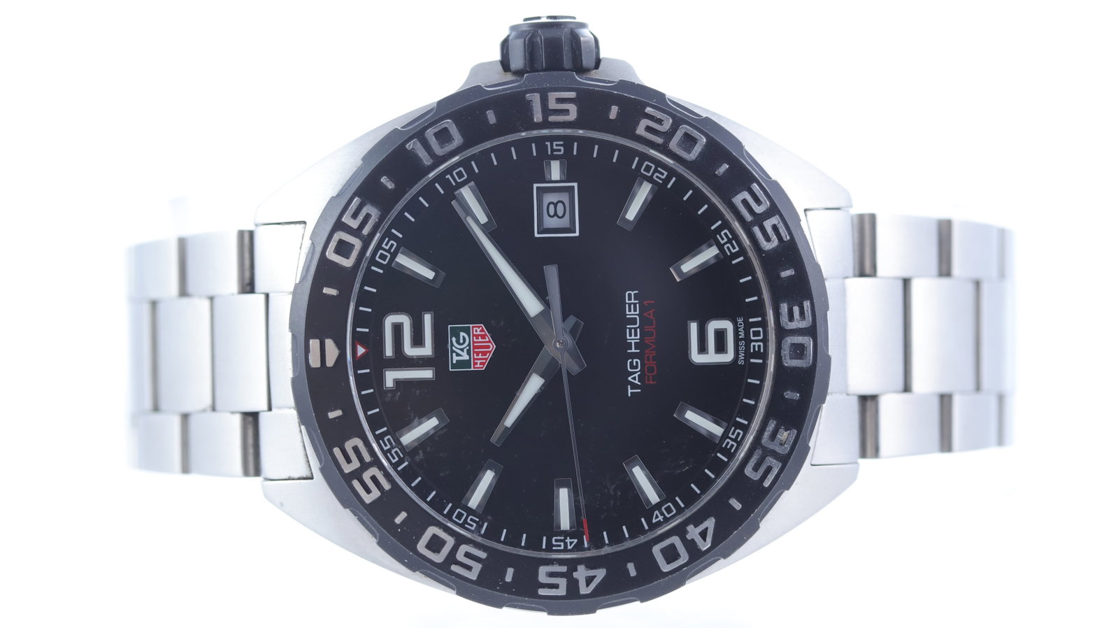 Tag Heuer Formula 1 Quartz Ref WAZ1110: Brand: Tag Heuer Model Name: Formula 1 Reference: WAZ1110 Movement type: Quartz Dial shape: Circular Dial colour: Black Dial features: Applied trapezium hour markers with lume inserts. Date aperture a