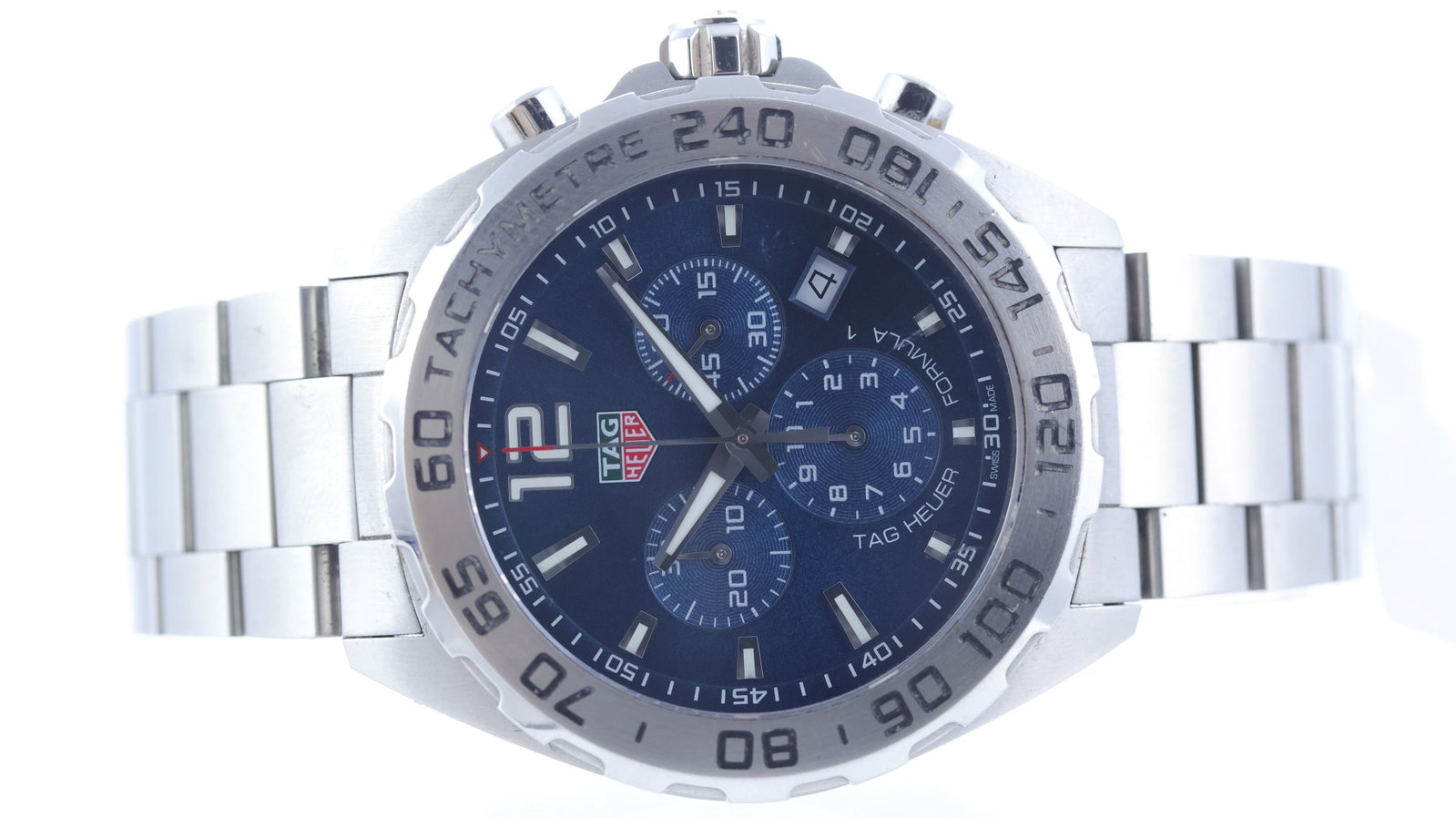 Tag Heuer Formula 1 Chronograph Ref CAZ101K: Brand: Tag Heuer Model Name: Formula 1 Reference: CAZ101K Movement type: Quartz Dial shape: Circular Dial colour: Sunburst, Blue Dial features: Applied trapezium hour markers with lume inserts. Date a