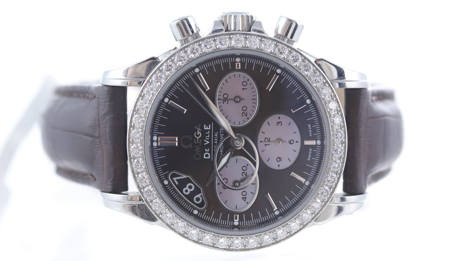 Omega De Ville Chronograph Diamond Set Bezel Circa 2006: Brand: Omega Model Name: De Ville Movement type: Automatic Movement calibre: Omega 3313 Year: Circa 2006 Dial shape: Circular Dial colour: Brown Dial features: Baton hour markers, three mother of pear