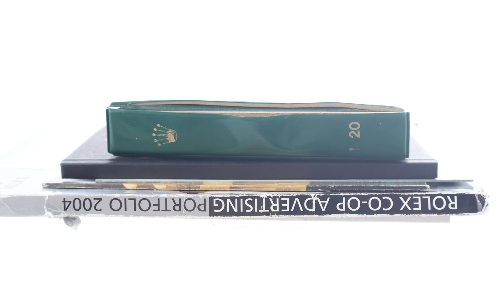 ROLEX BOOKS INCLUDING RARE ROLEX R20 FOLIO; 2006 Rolex Oyster Perpetual Brochure, 2004 Rolex Co-op (1 of 7)