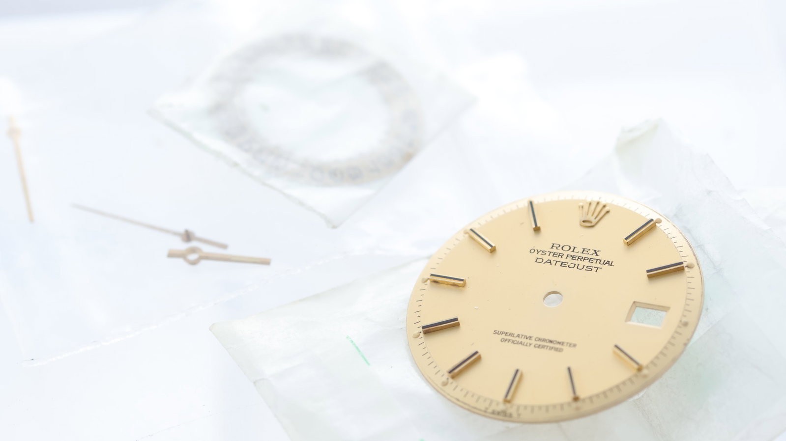 ROLEX OYSTER PERPETUAL DATEJUST DIAL, HANDS AND DATE WHEEL, champagne dial with black baton hour (1 of 4)