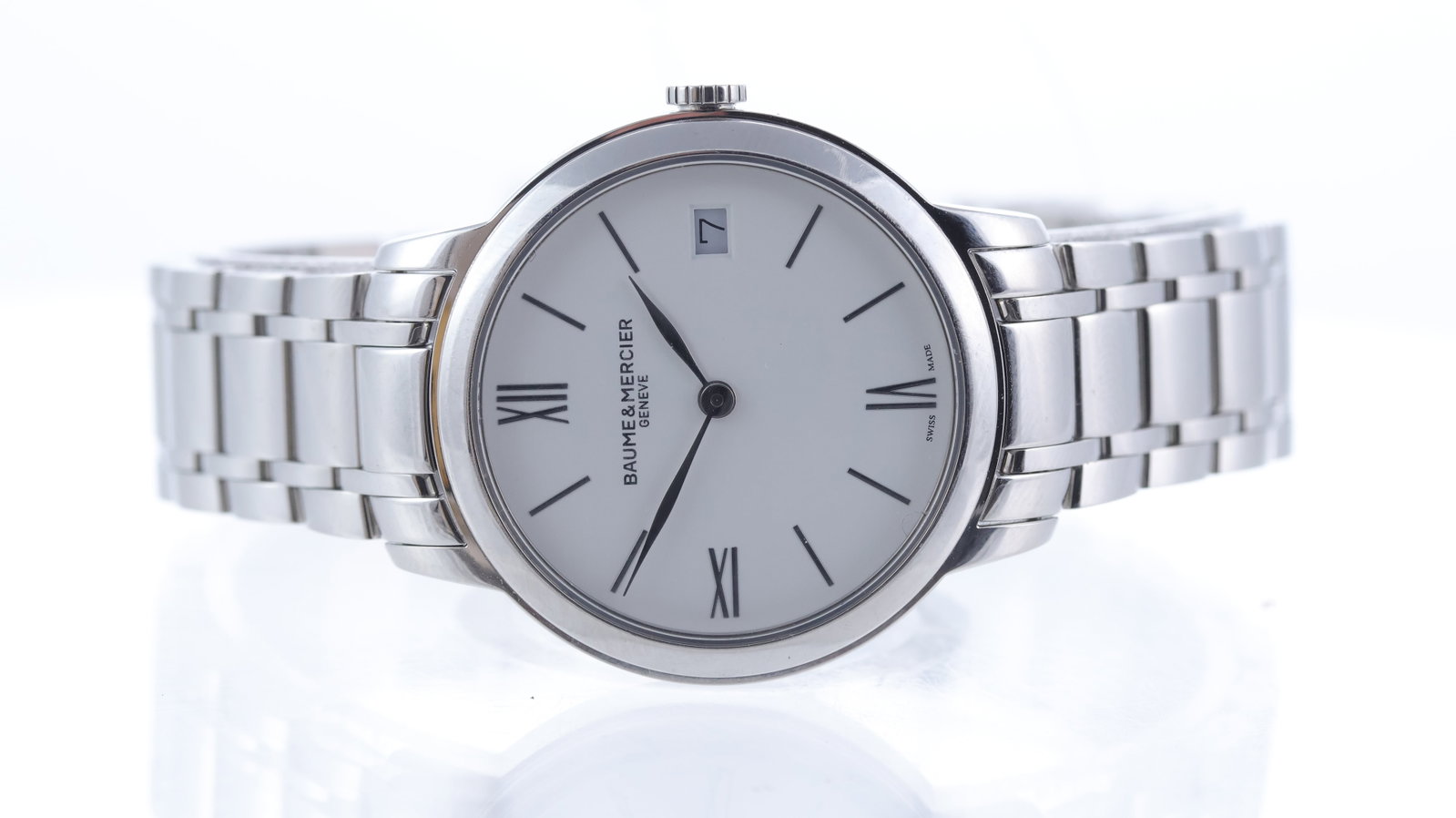 Baume & Mercier Classima Ref 65808 with Box and Papers 2017: Brand: Baume & Mercier Model Name: Classima Reference: 65808 Movement type: Quartz Year: 2017 Dial shape: Circular Dial colour: White Dial features: Roman and baton hour markers, quickset date