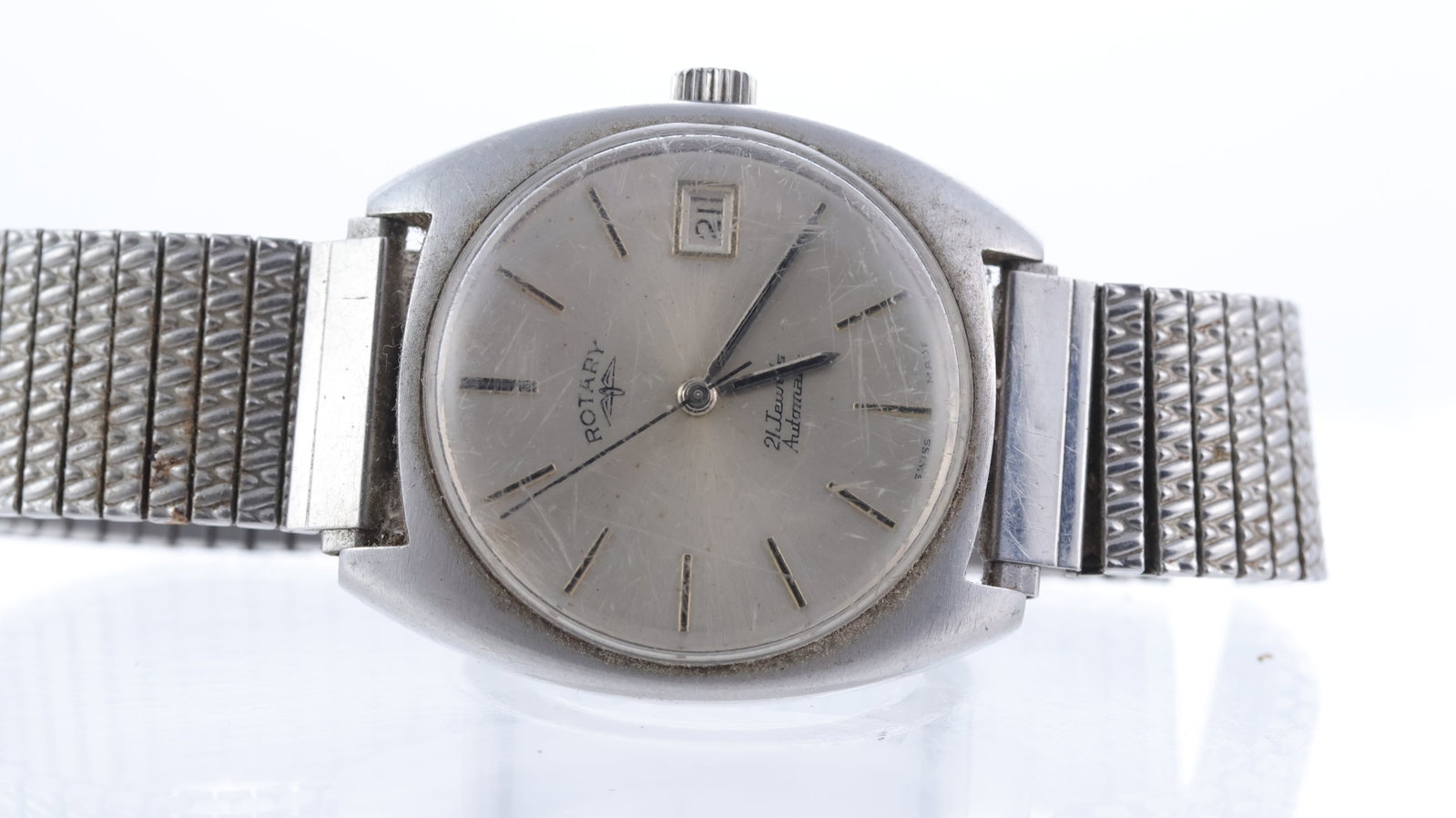 *To Be Sold Without Reserve* Sold As Seen - Rotary Automatic: A stainless steel Rotary wristwatch. Automatic movement. Applies baton hour markers, date aperture. 70's style case. case back stamped 446. Watch is intermittently running. In poor condition overall