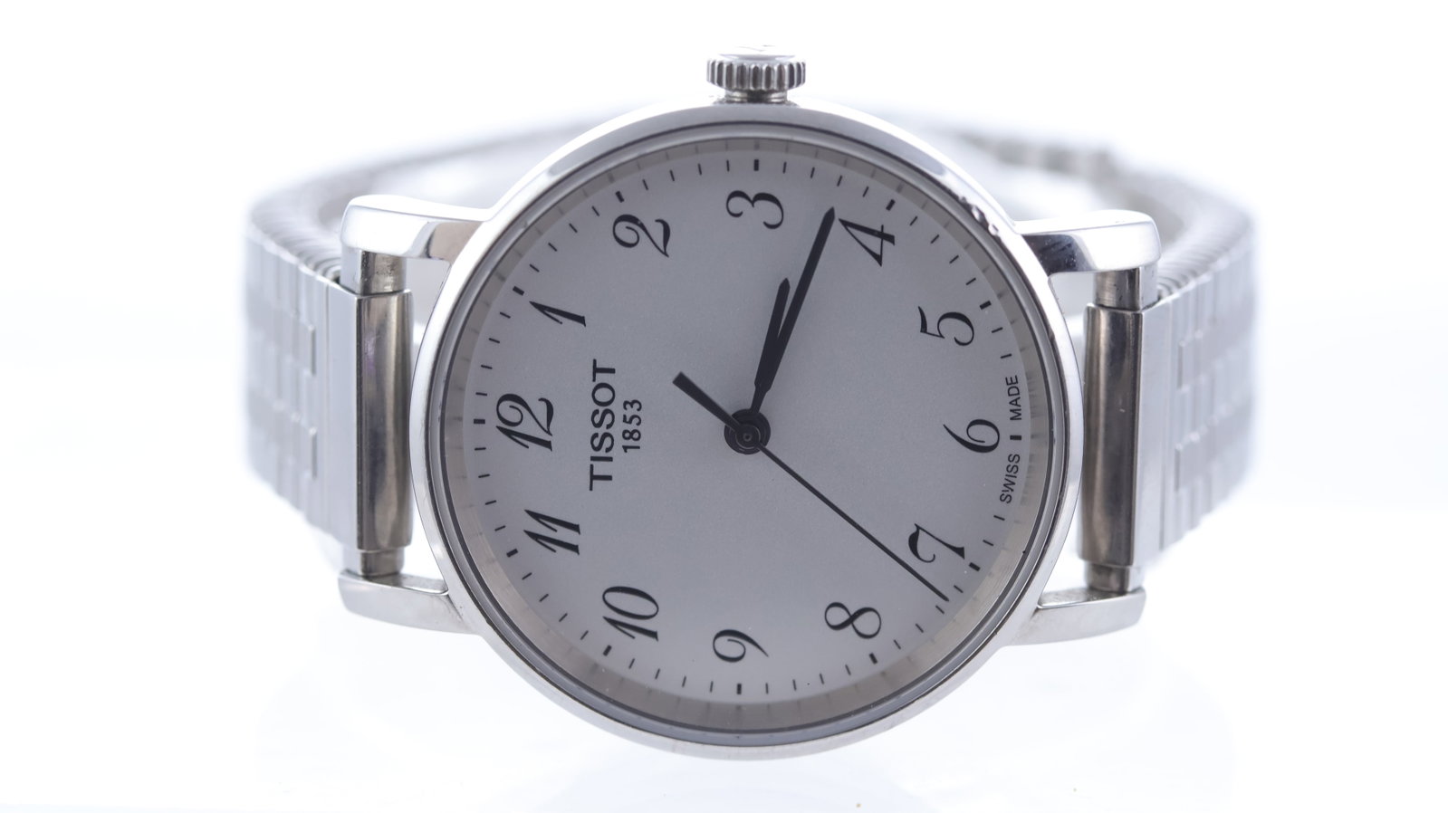 Tissot Everytime Ref T109210A: Brand: Tissot Model Name: Everytime Reference: T109210A Movement type: Quartz Dial shape: Circular Dial colour: White Dial features: Arabic numerals Bezel: Smooth bezel Case size: 30mm Case material: