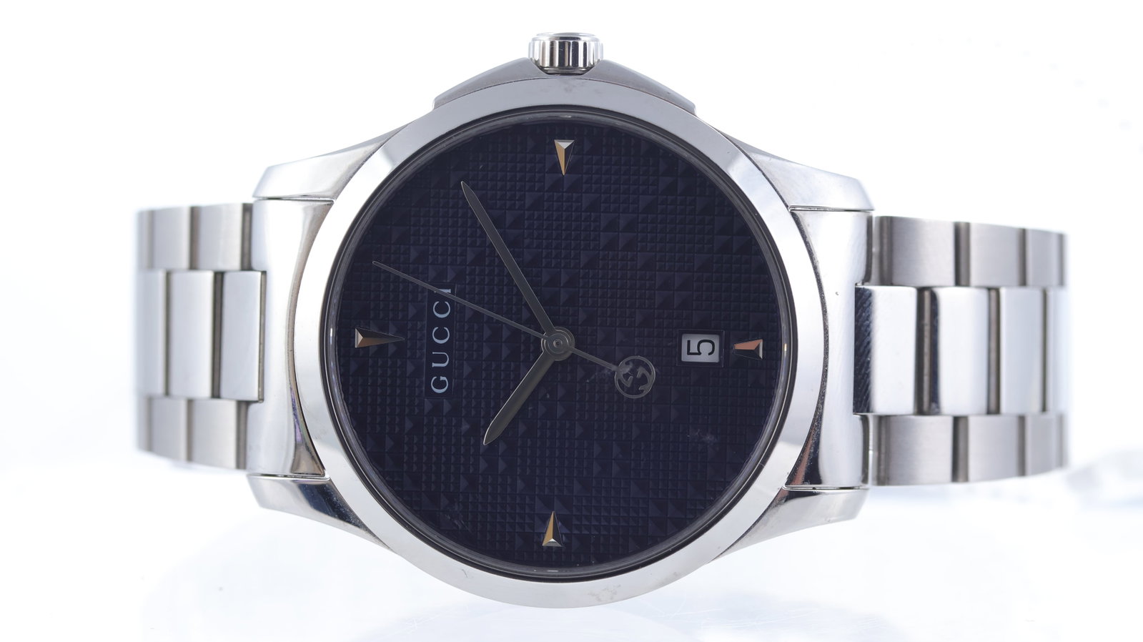 Gucci G Timeless Ref 126.4 with Box and Papers 2018: Brand: Gucci Model Name: G Timeless Reference: 126.4 Movement type: Quartz Year: 2018 Box: Full Box Papers: Warranty Papers Dial shape: Circular Dial colour: Blue Dial features: Pyramid textured dial