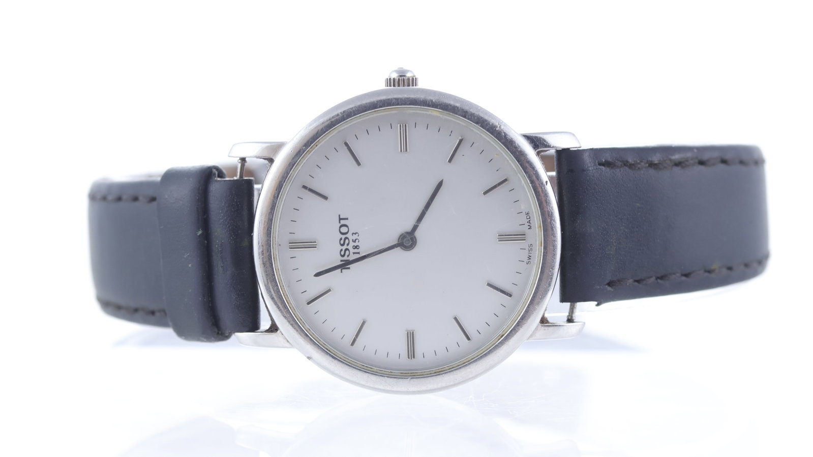 Tissot Dress Watch Ref C276K: Brand: Tissot Model Name: Dress Watch Reference: C276K Movement type: Quartz Dial shape: Circular Dial colour: White Dial features: Baton hour markers Bezel: Smooth Case size: 31mm Case material:
