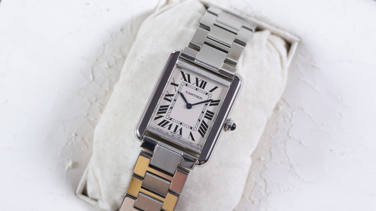 Cartier Tank Solo Quartz Ref 3710 with Box and Papers 2012: Brand: Cartier Model Name: Tank Solo Reference: 3710 Movement type: Quartz Year: 2012 Box: Full Box Papers: Full Set Papers Dial shape: Rectangular Dial colour: Silver Dial features: Blue steel hands.