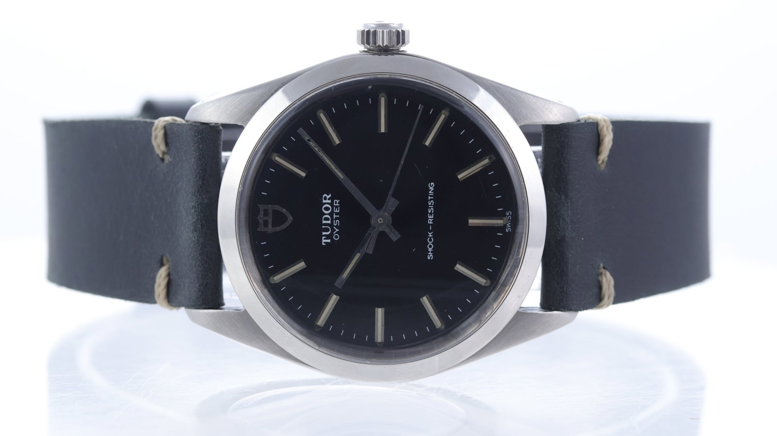 Vintage Tudor Oyster Ref 90000 Circa 1979: Brand: Tudor Model Name: Oyster Reference: 90000 Movement type: Manual Wind Year: Circa 1979 Dial shape: Circular Dial colour: Black Dial features: Baton hour markers, Tudor shield logo at 12 Bezel: S