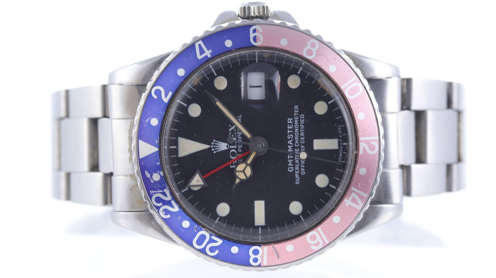 Rolex GMT Master 'Pepsi' Ref 1675 Circa 1960: Brand: Rolex Model Name: GMT Master Reference: 1675 Movement type: Automatic Movement calibre: Rolex 1570 Year: Circa 1960 Dial shape: Circular Dial colour: Black Dial features: Matte Dial, Mercedes h