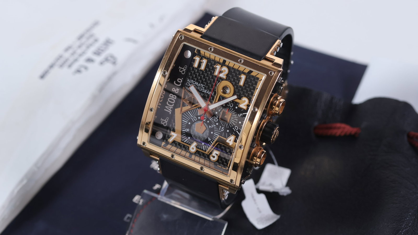 Jacob & Co Epic 1 18ct rose gold Ref Q3-BCB Circa 2011: Brand: Jacob & Co Model Name: Epic 1 Reference: Q3-BCB Movement type: Automatic Movement calibre: Jacob & Co 2121 Year: Circa 2011 Dial shape: Square Dial colour: Carbon fiber Dial features: Arabic nu