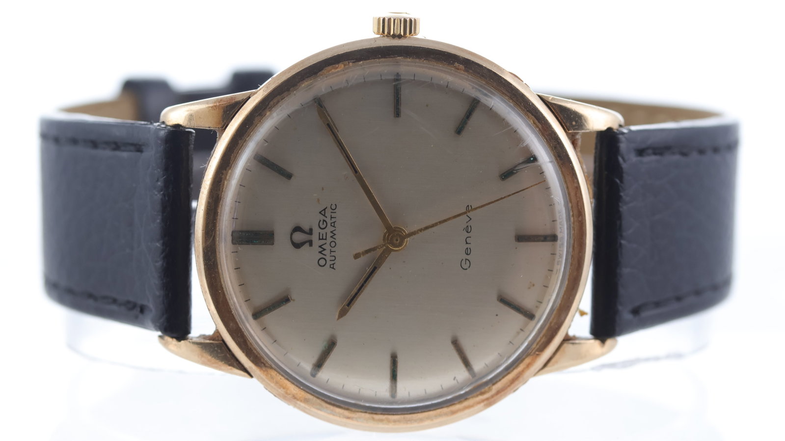 Omega Geneve 9ct yellow gold Ref 161/25418 Circa 1966: Brand: Omega Model Name: Geneve Reference: 161/25418 Movement type: Automatic Movement calibre: Omega 552 Year: Circa 1966 Dial shape: Circular Dial colour: Silver Dial features: Patina dial with bato