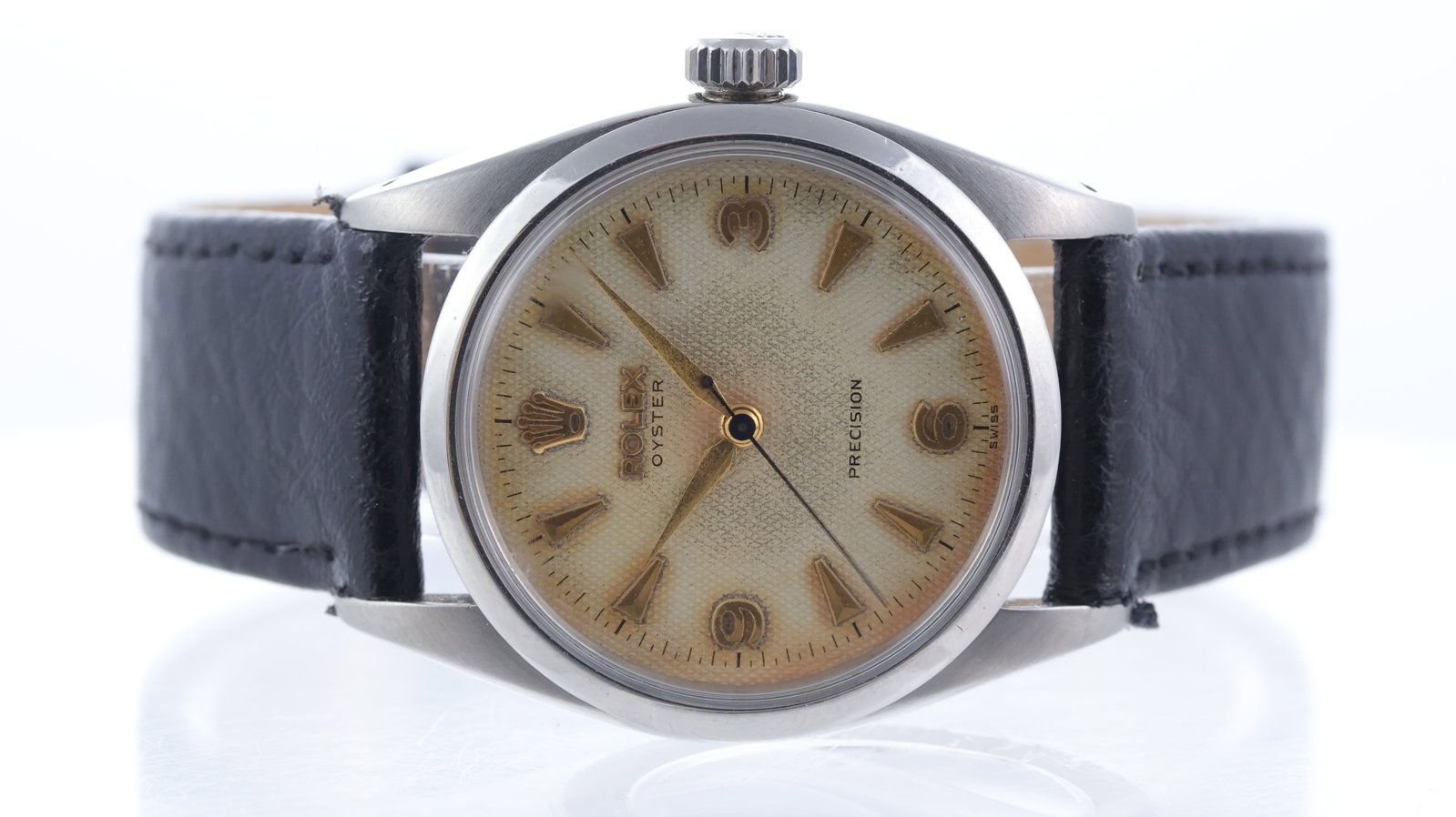 Vintage Rolex Oyster Precision 'Honeycomb Dial' Ref 6426/6427 1959: Brand: Rolex Model Name: Oyster Precision Reference: 6426/6427 Movement type: Manual Wind Movement calibre: Rolex 1210 Year: 1959 Dial shape: Circular Dial colour: Cream Patina Dial features: Applied 