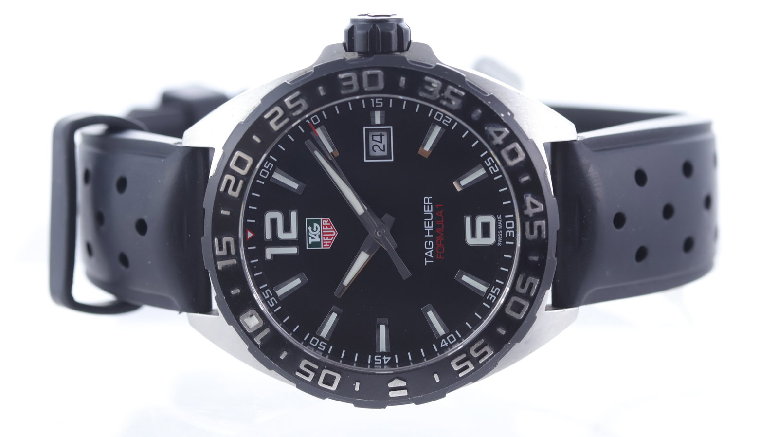 Tag Heuer Formula 1 Ref WAZ1110 with Papers Circa 2018: Brand: Tag Heuer Model Name: Formula 1 Reference: WAZ1110 Movement type: Quartz Year: Circa 2018 Papers: Guarantee Card Papers features: Tag Heuer Warranty Card Dial shape: Circular Dial colour: Black