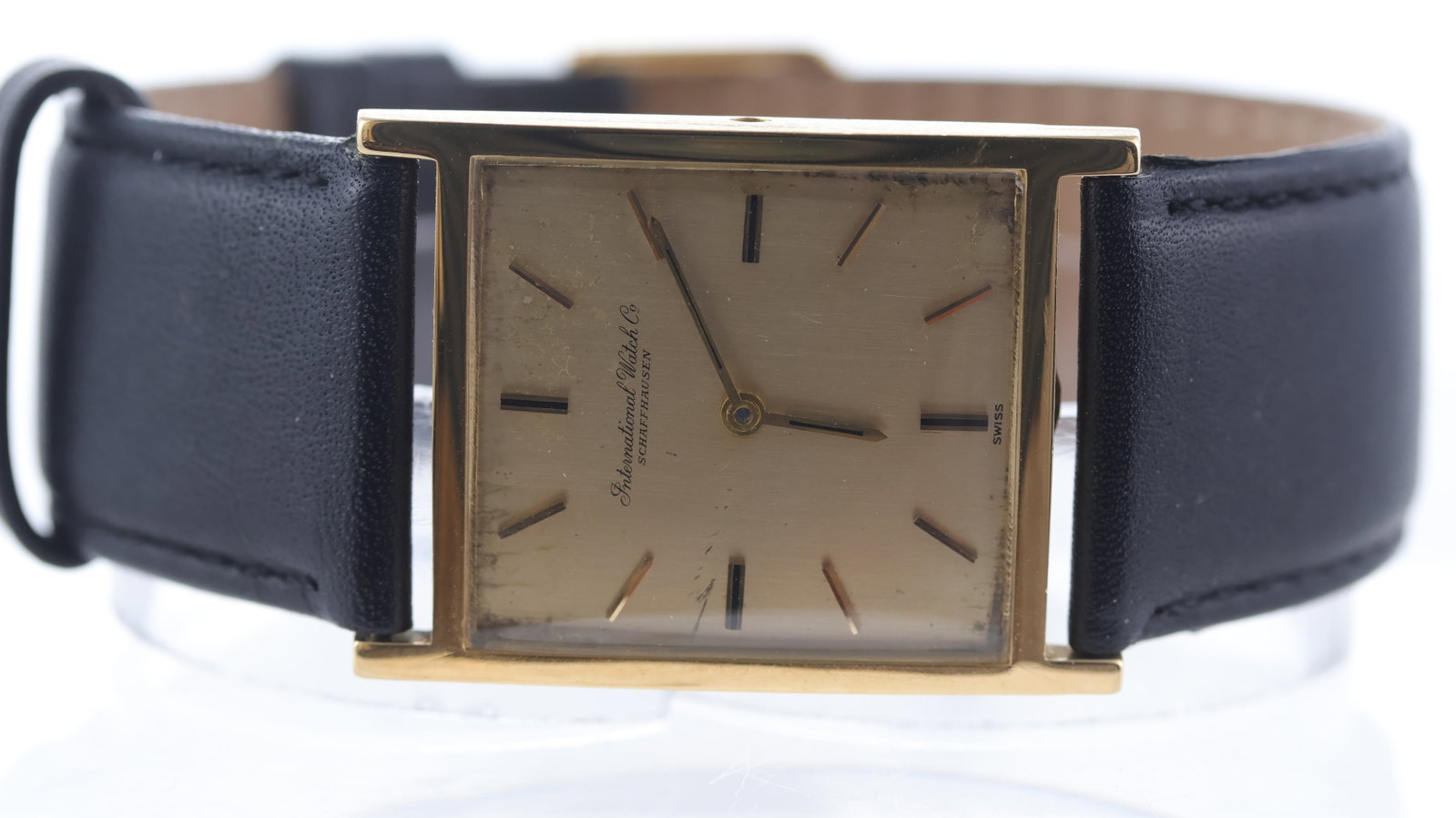 IWC Tank 18ct yellow gold Ref 1540: Brand: IWC Model Name: Tank Reference: 1540 Movement type: Manual Wind Movement calibre: IWC 422 Movement features: IWC signed Dial shape: Square Dial colour: Champagne Dial features: Patina dial with