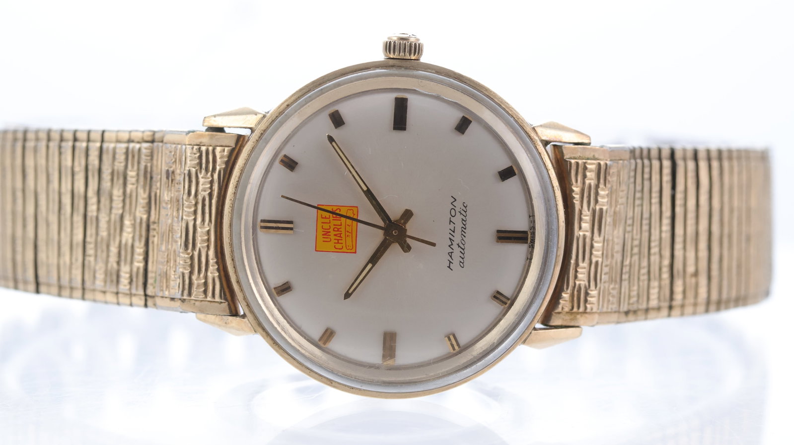 *To Be Sold Without Reserve* Hamilton Uncle Charlie's Signed Watch Automatic Circa 1960's: Brand: Hamilton Model Name: Dress Watch Movement type: Automatic Year: Circa 1960's Dial shape: Circular Dial colour: Silver Dial features: Baton hour markers, double signed with Uncle Charlie's logo 