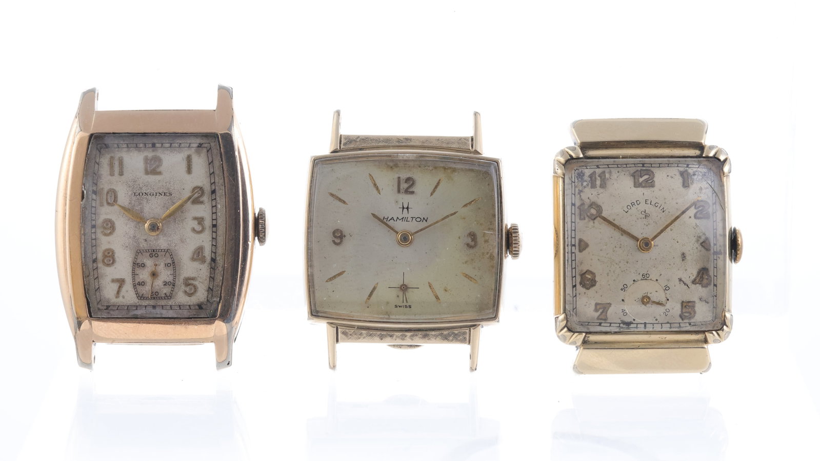 A Job Lot of 3x Vintage Manual Wind Wristwatches: A Job Lot of 3x Vintage Manual Wind Wristwatches - A collection of three vintage watches comprising a Longines, Hamilton, and Lord Elgin. All three watches are currently running and can be fully wound