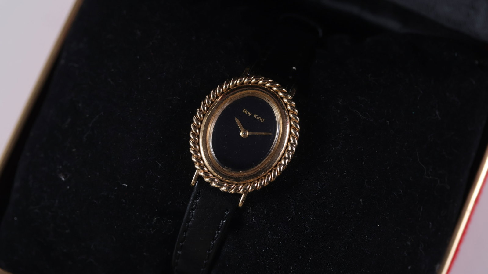 Ladies Roy King Dress Watch 9ct Gold with Box Circa 1970's: Brand: Roy King Model Name: Dress Watch Movement type: Manual Wind Year: Circa 1970's Box: Inner and outer box Dial shape: Oval Dial colour: Black Dial features: Black gloss dial Case size: 23mm Case 